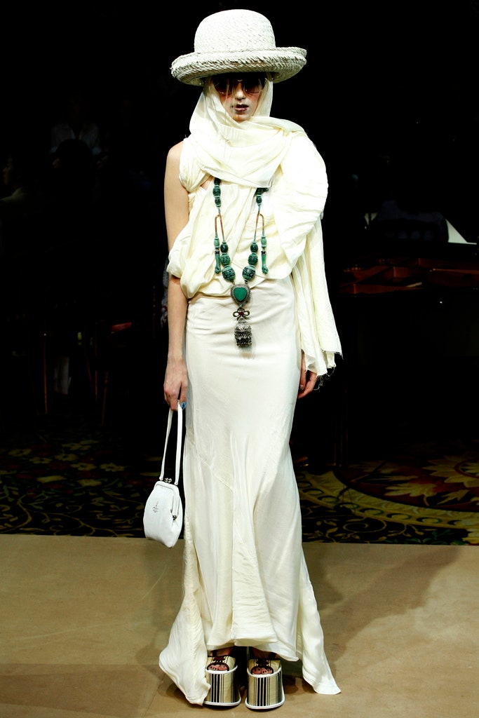 white silk fitted gown with accessories