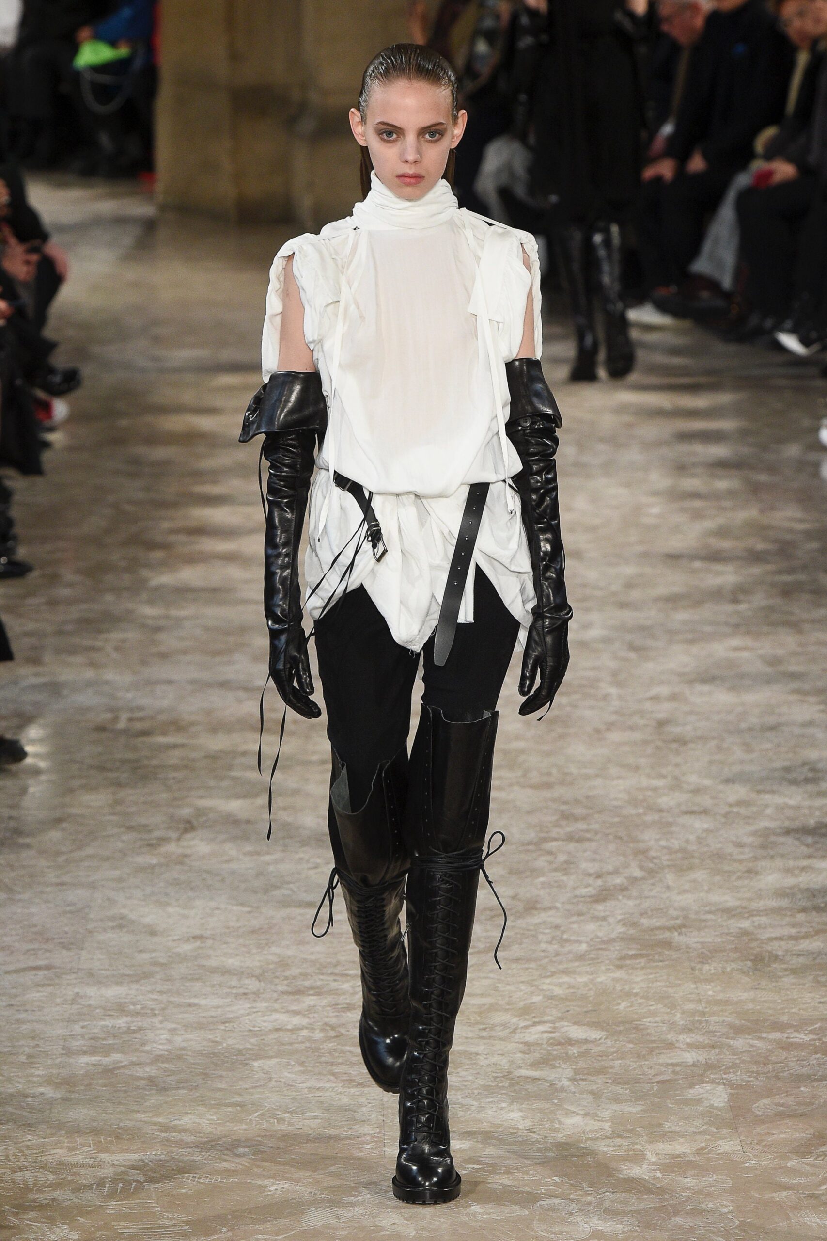 white silk fitted blouse with black leather pants