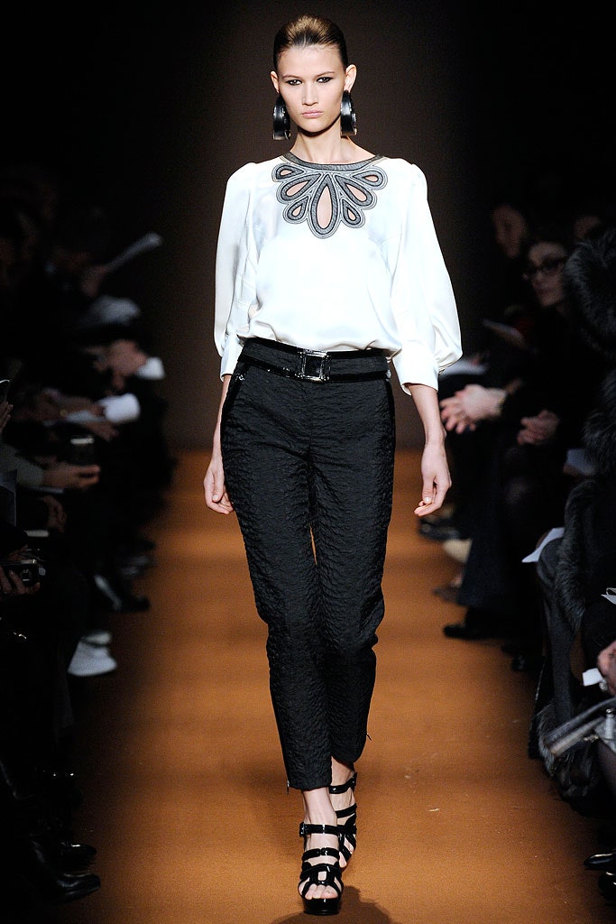 white silk blouse and black pants