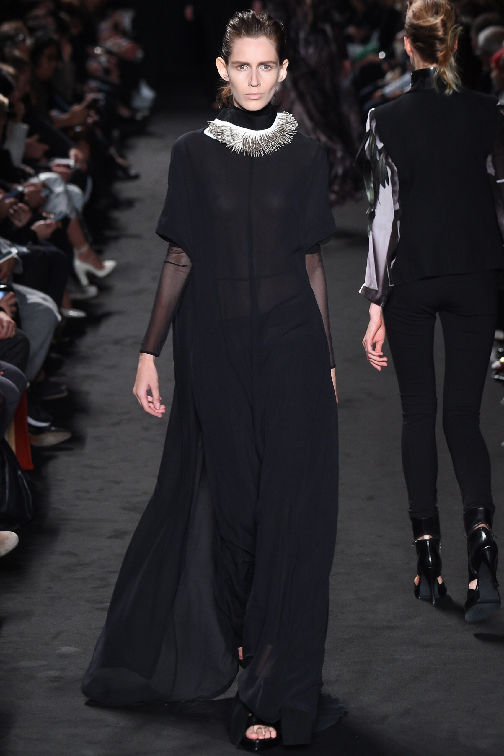 black flowing sleeveless dress