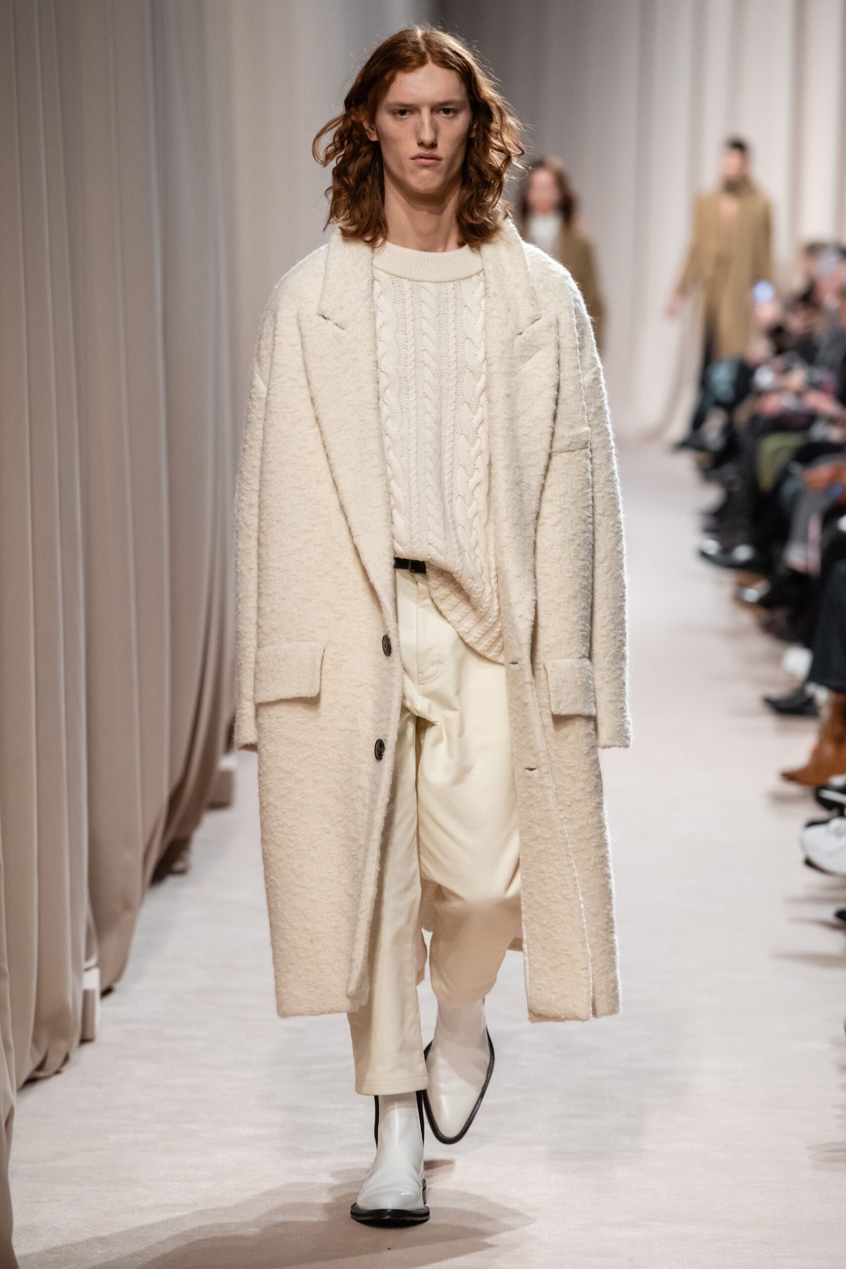 white wool coat with cream sweater
