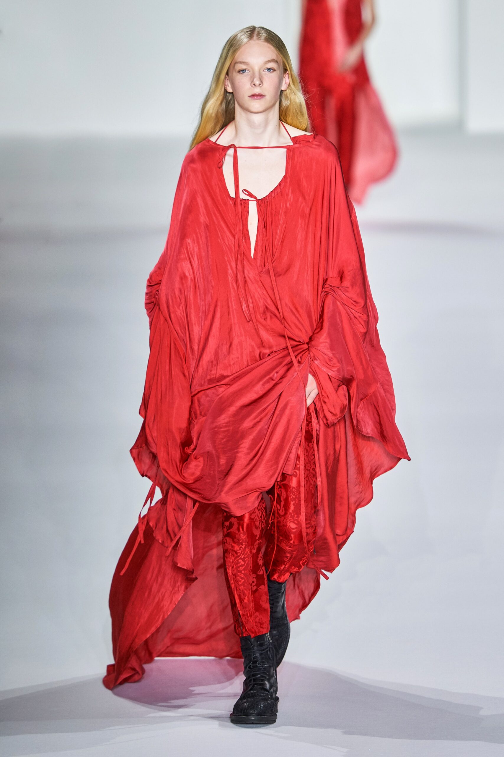 red flowing sleeveless dress