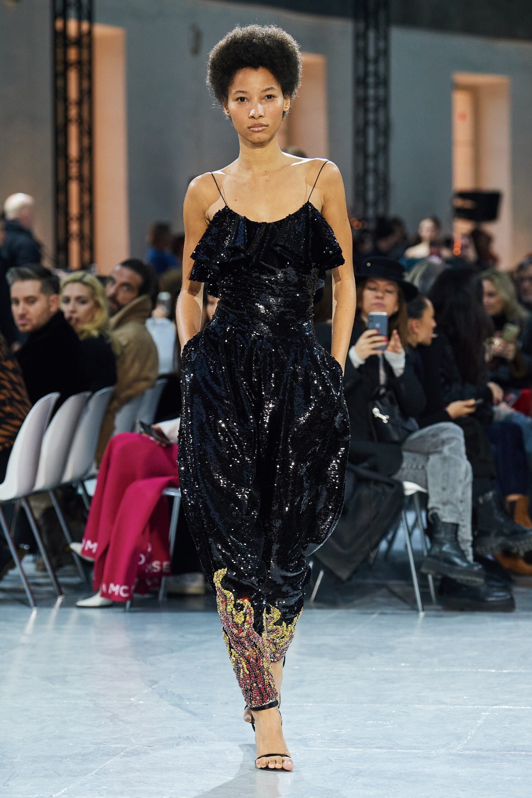 black sequin sleeveless jumpsuit
