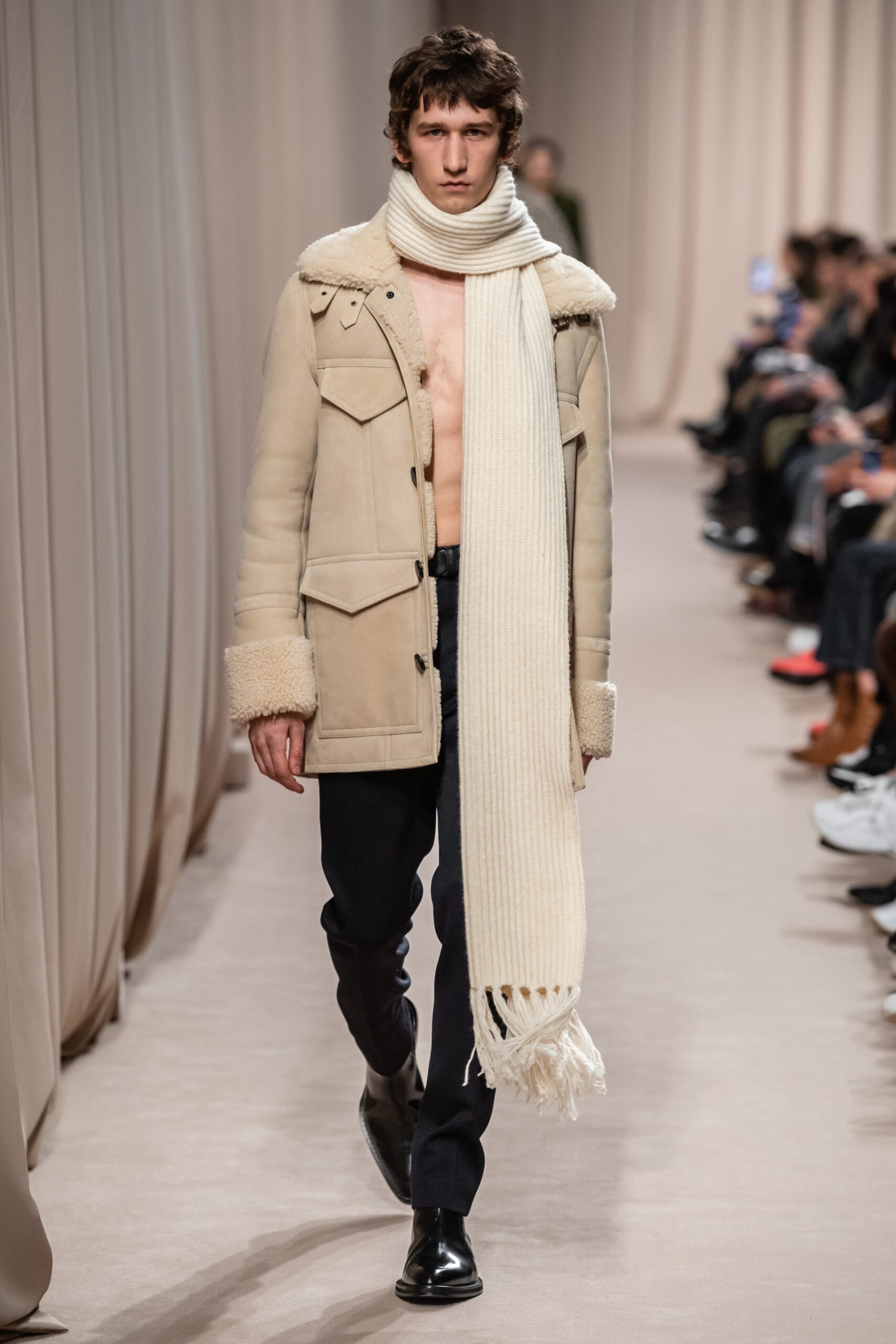 beige wool coat with white scarf