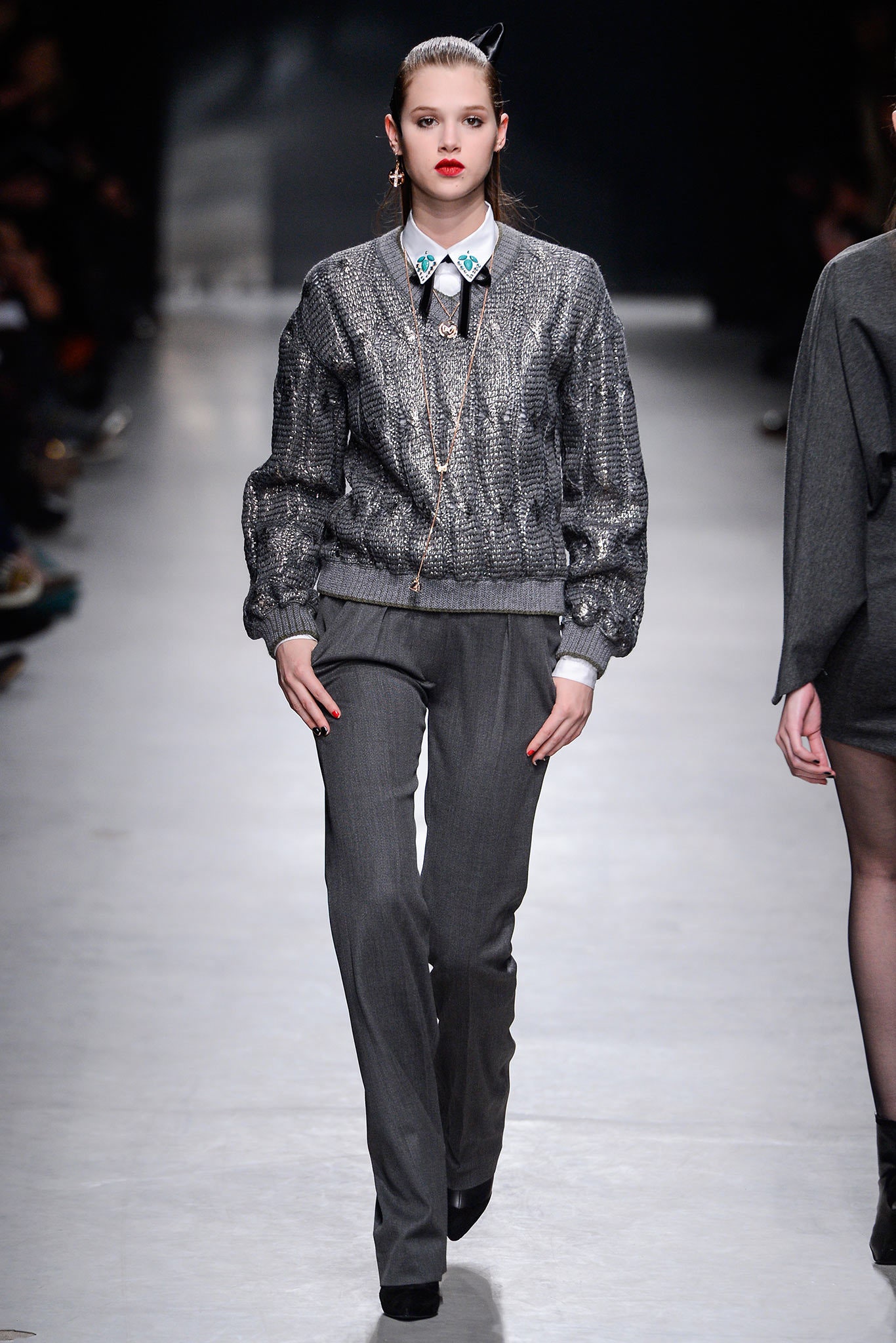 gray knit sweater and tailored pants