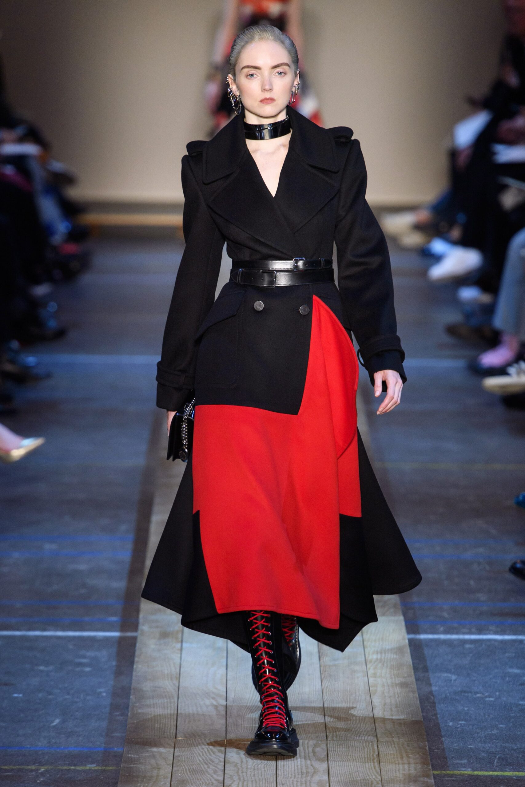 black wool asymmetric coat with red detail
