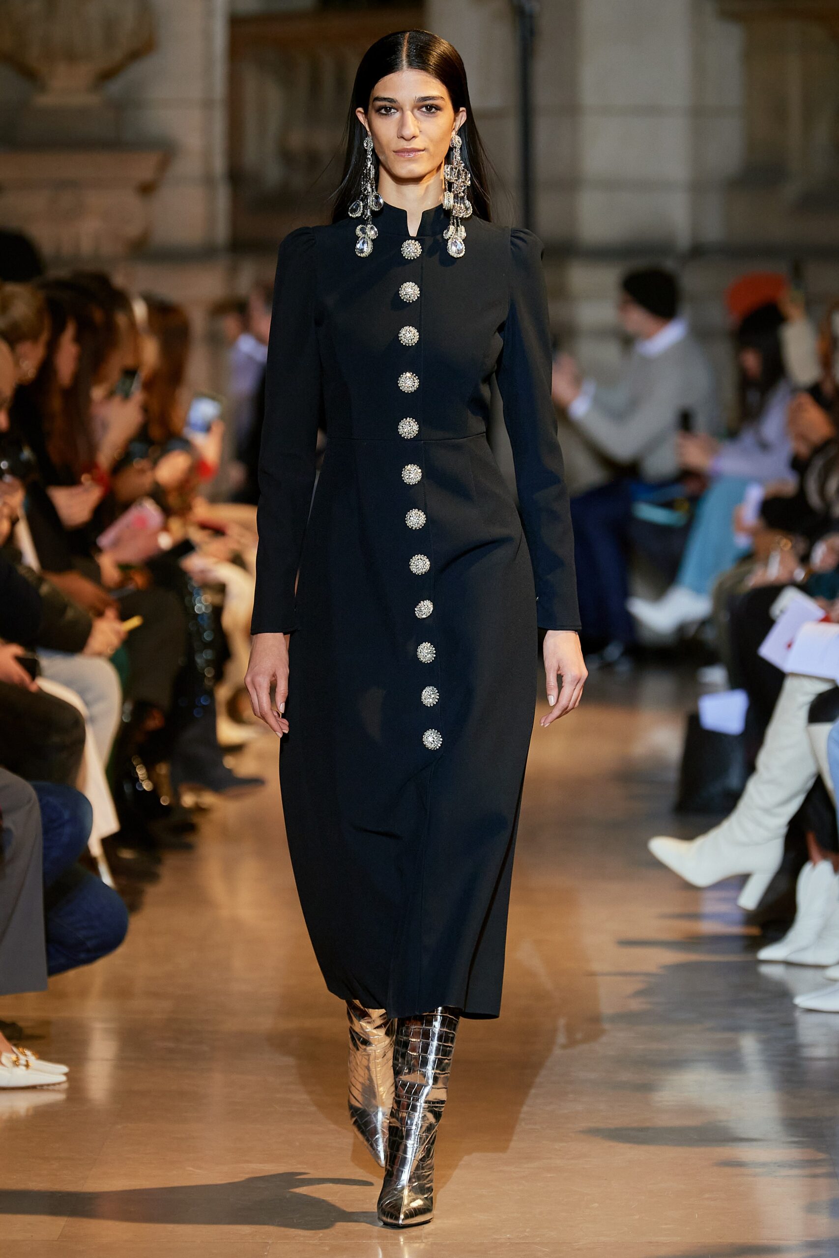 black fitted midi dress with silver boots