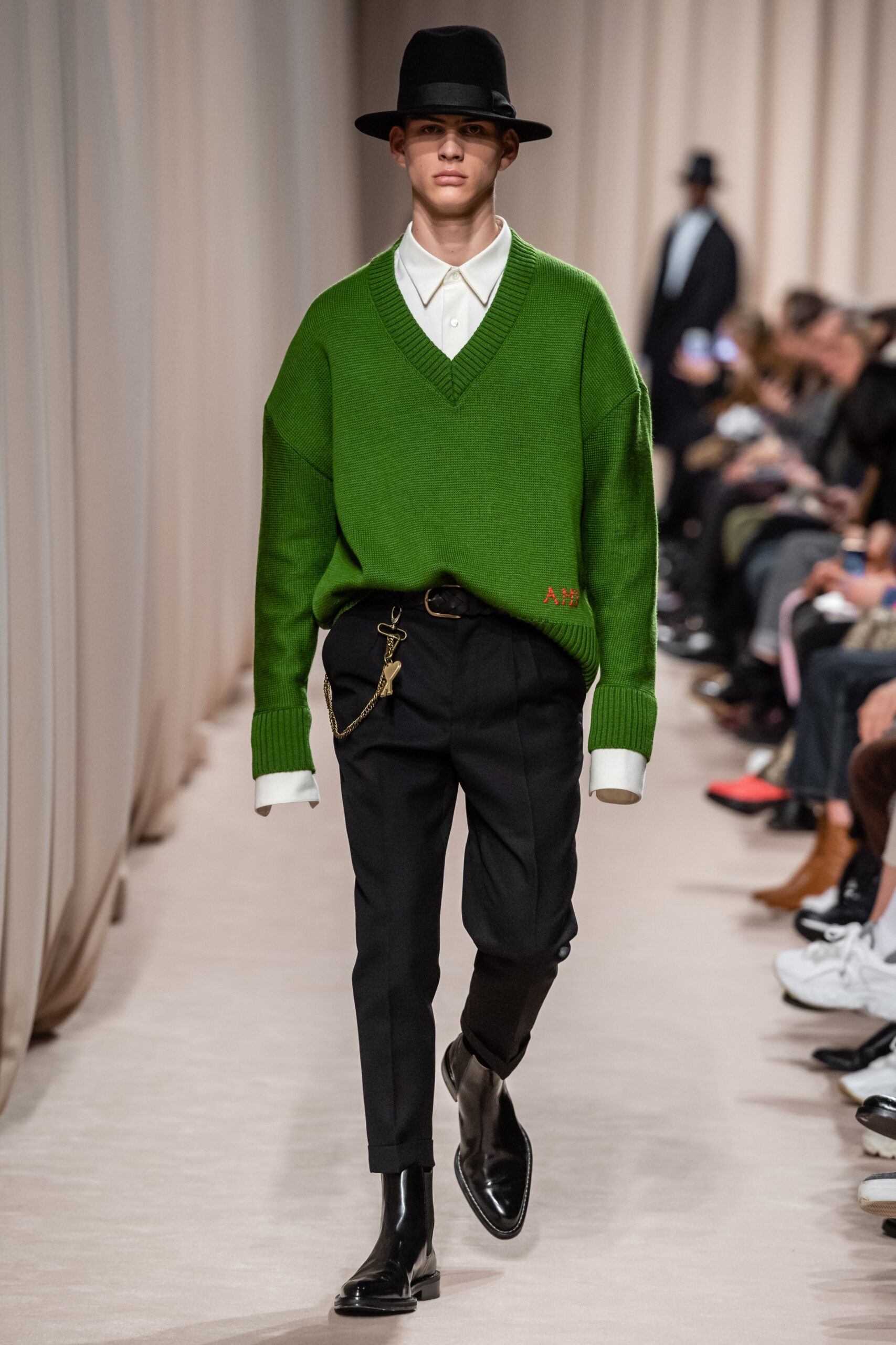 oversized green sweater with tailored pants