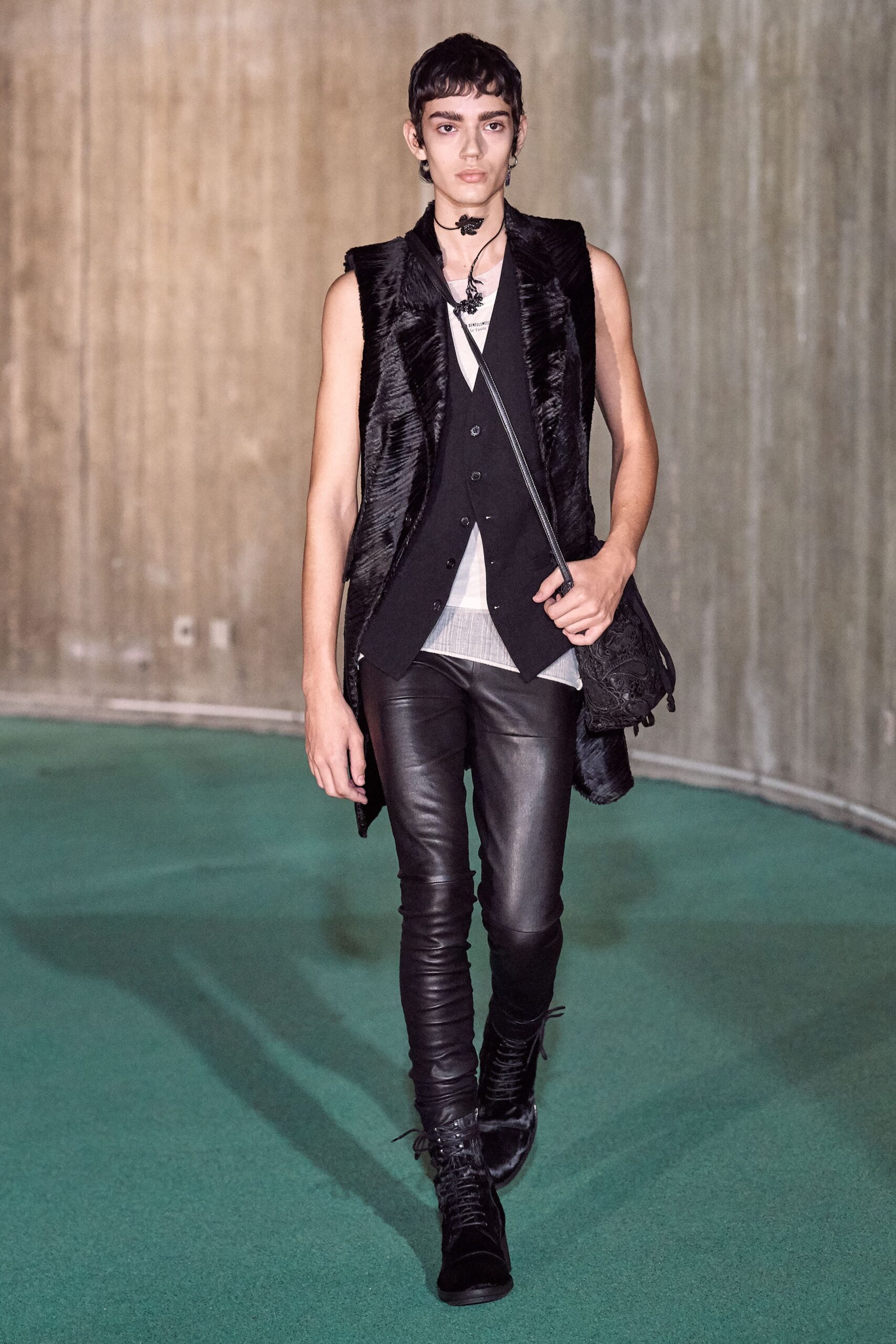 black leather vest and pants