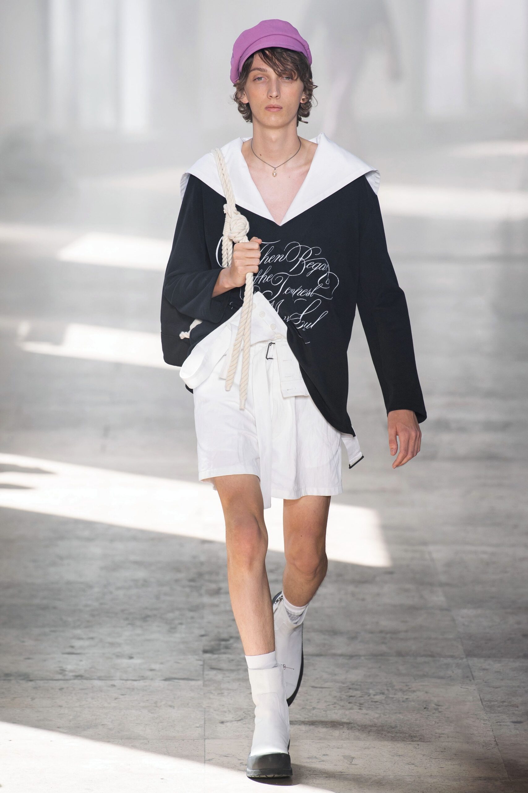 black relaxed shirt with white shorts