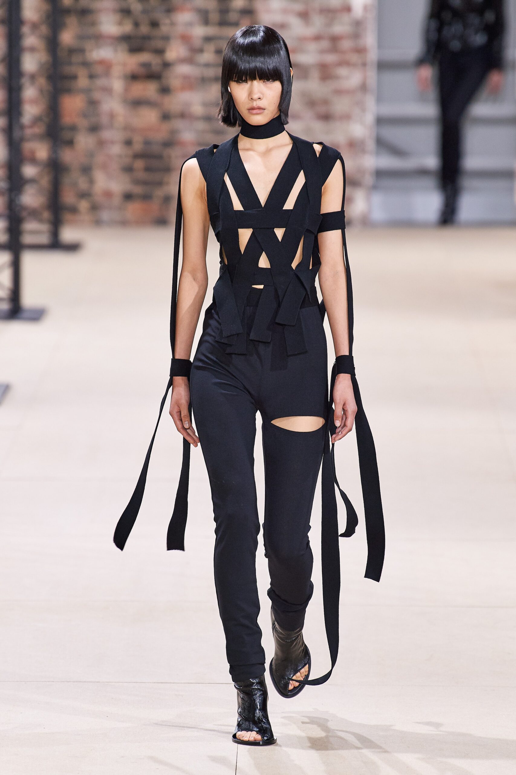 black fitted sleeveless jumpsuit