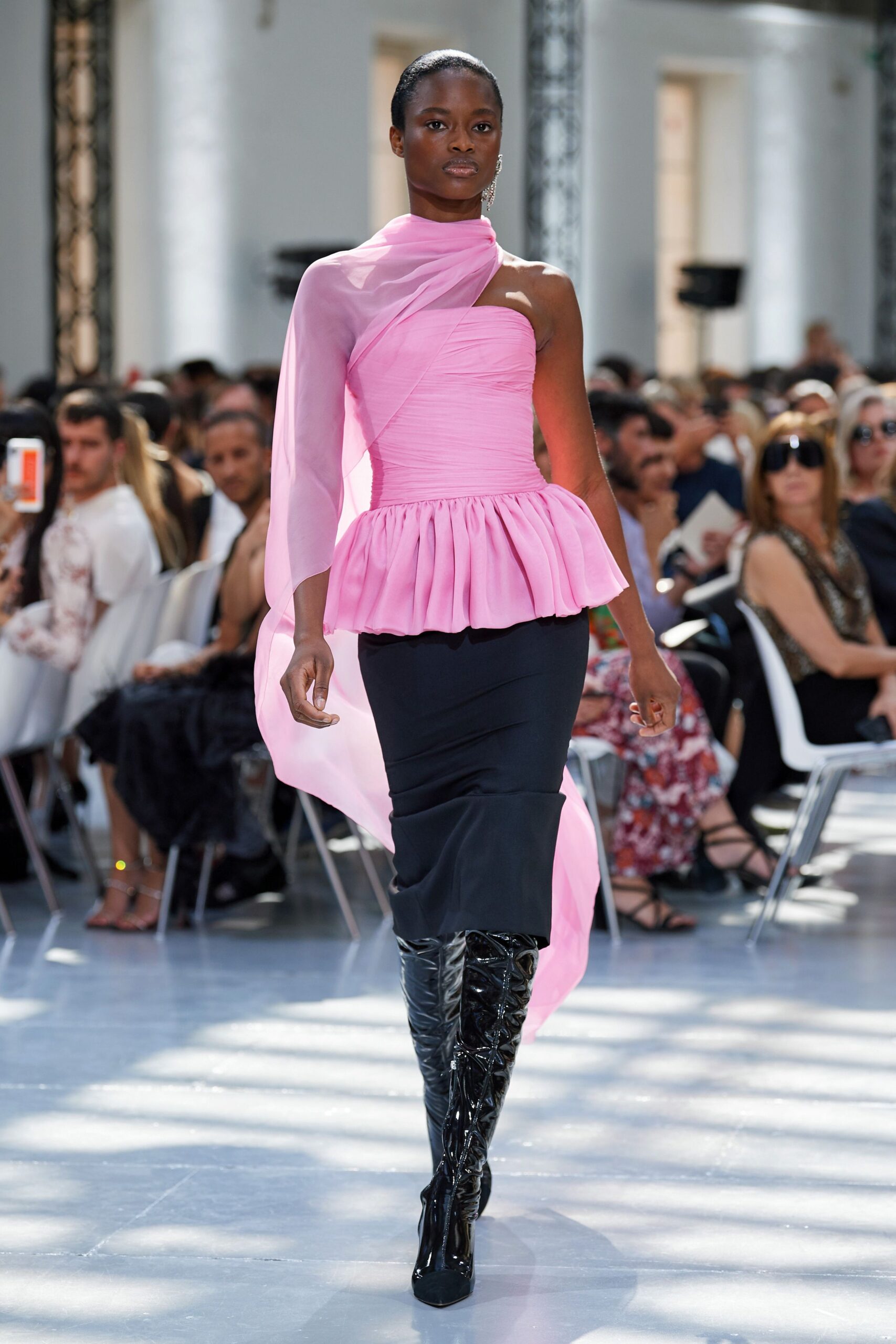 pink off-shoulder midi dress with black boots