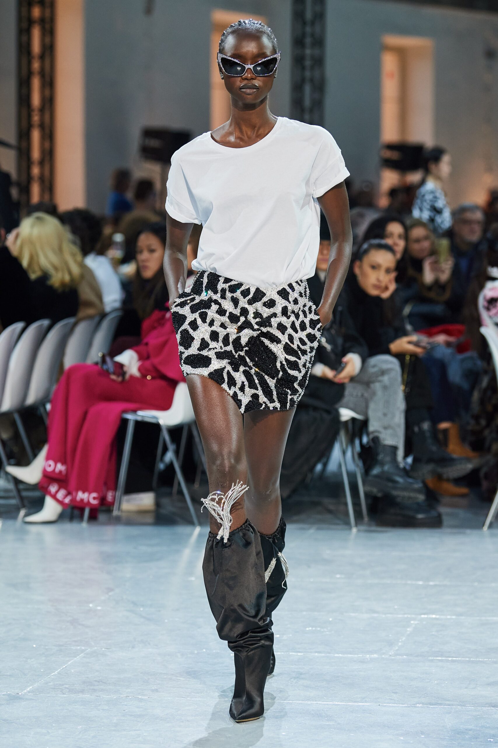 white relaxed top with sequined skirt