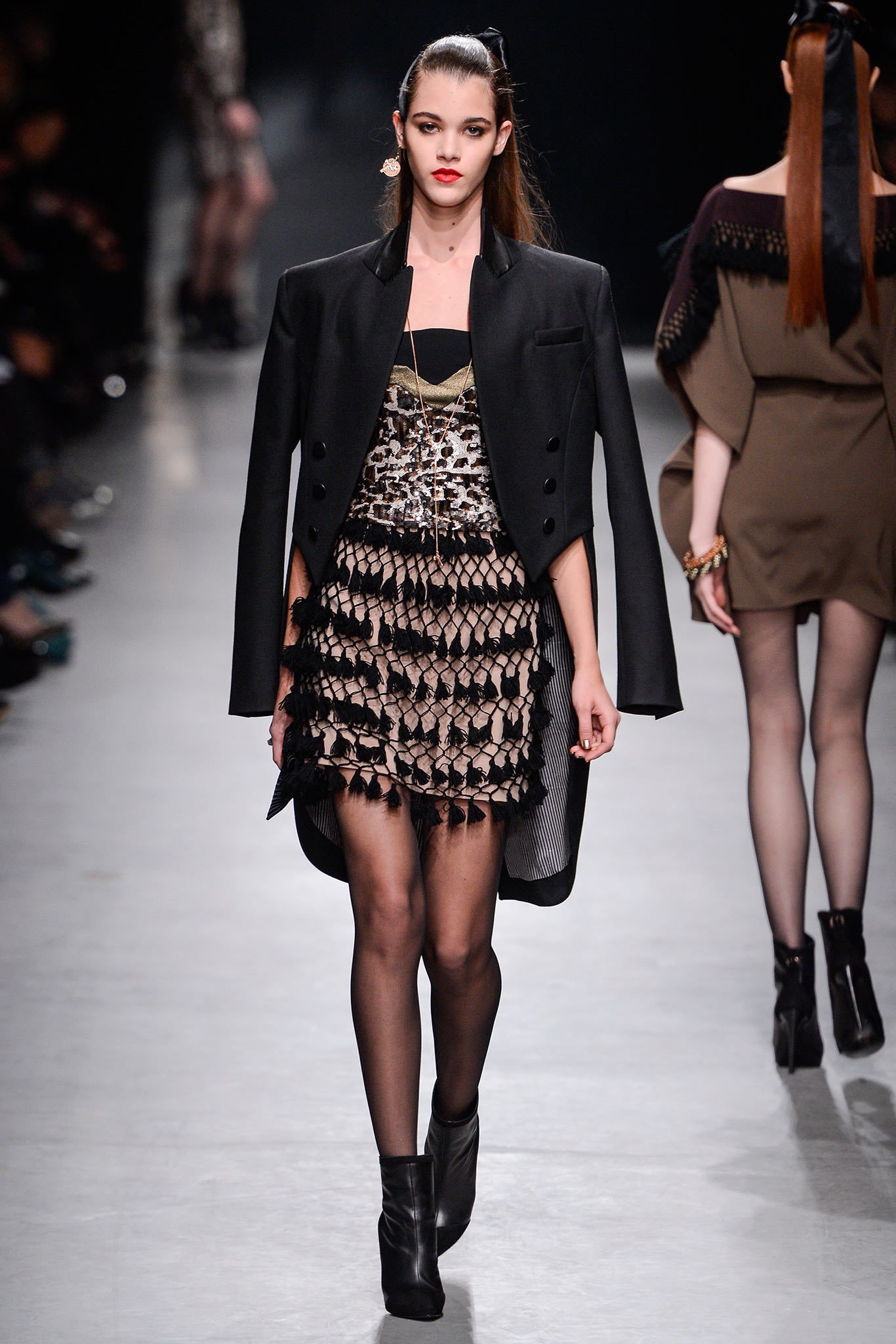 black structured coat and lace dress