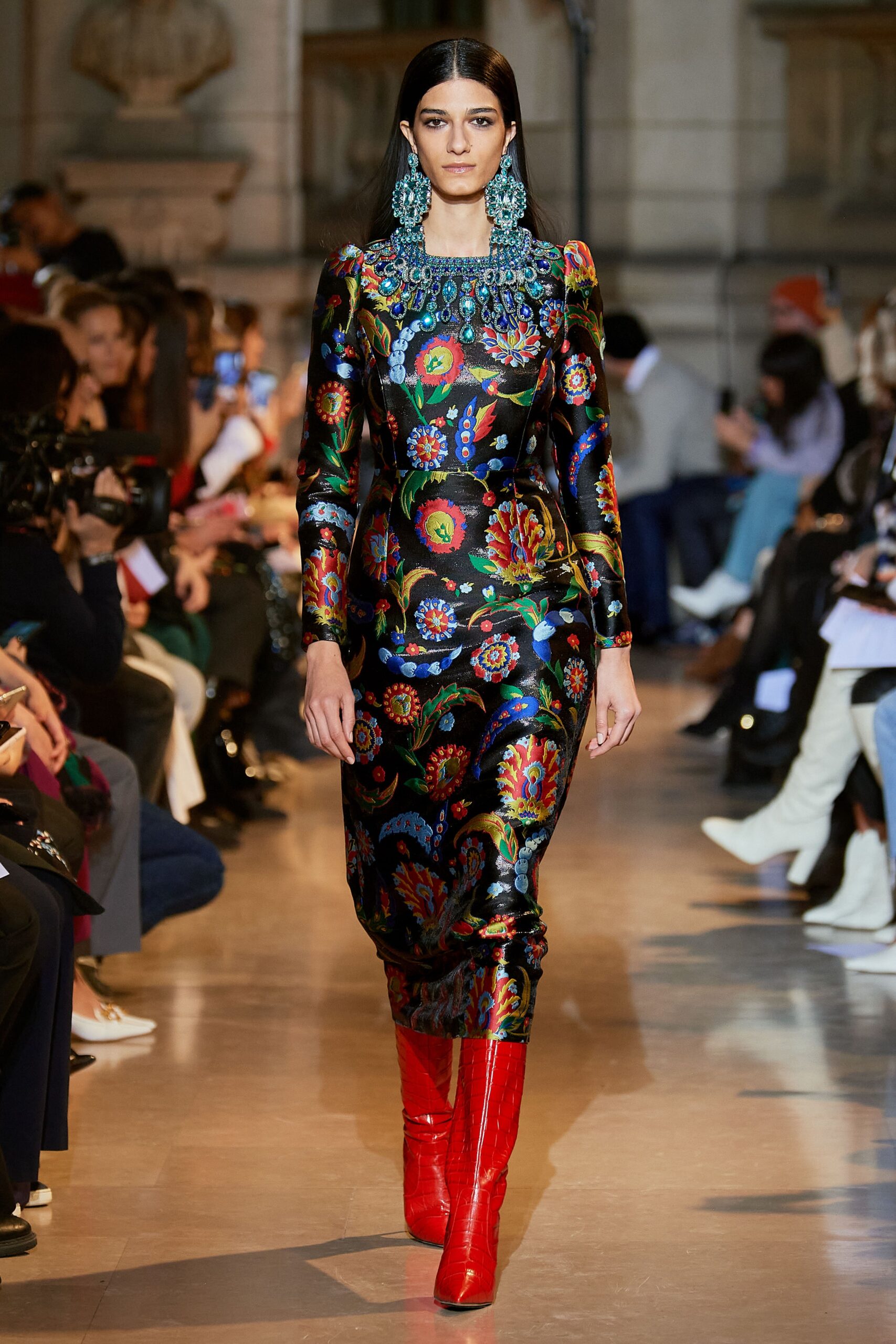 black multi embroidered midi dress with red boots