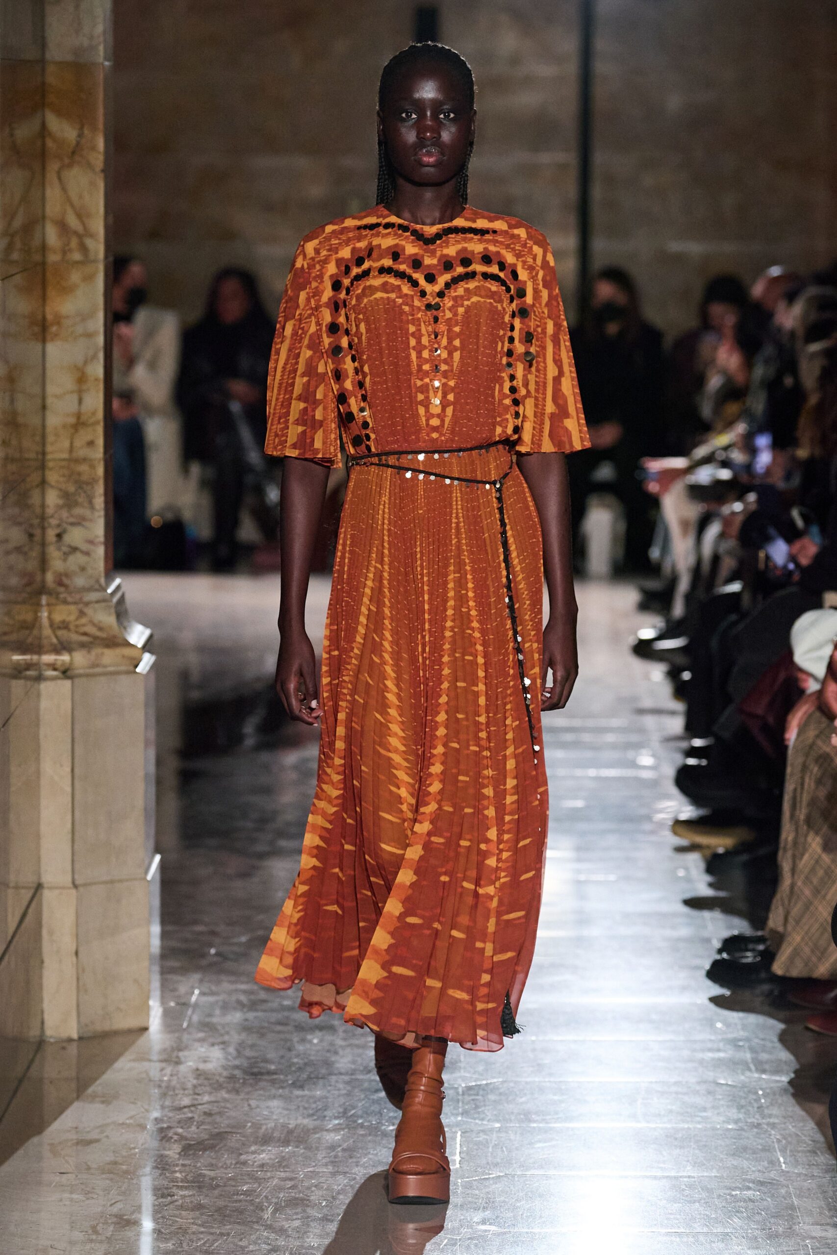 fitted orange pleated dress