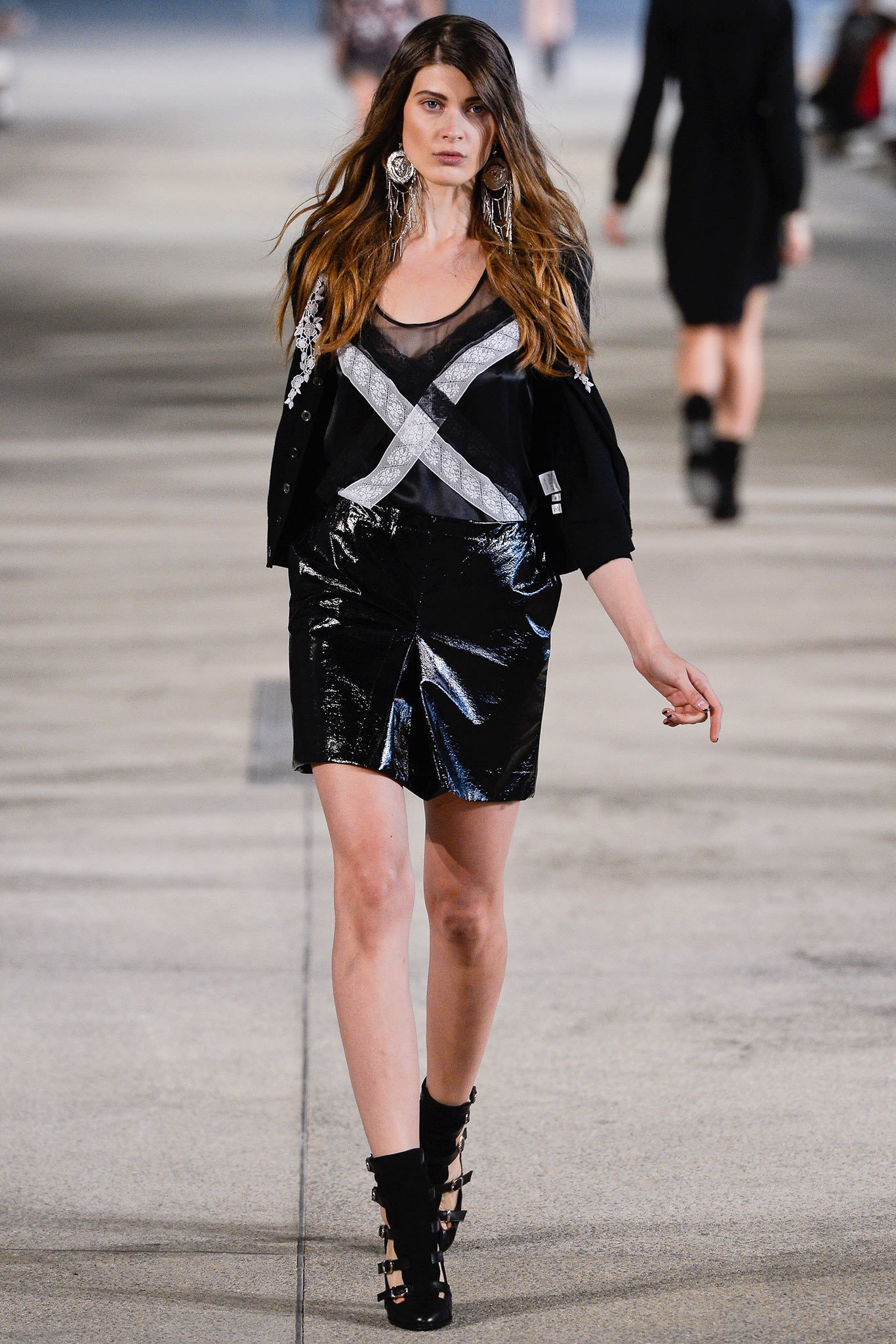 black fitted jacket and mini skirt