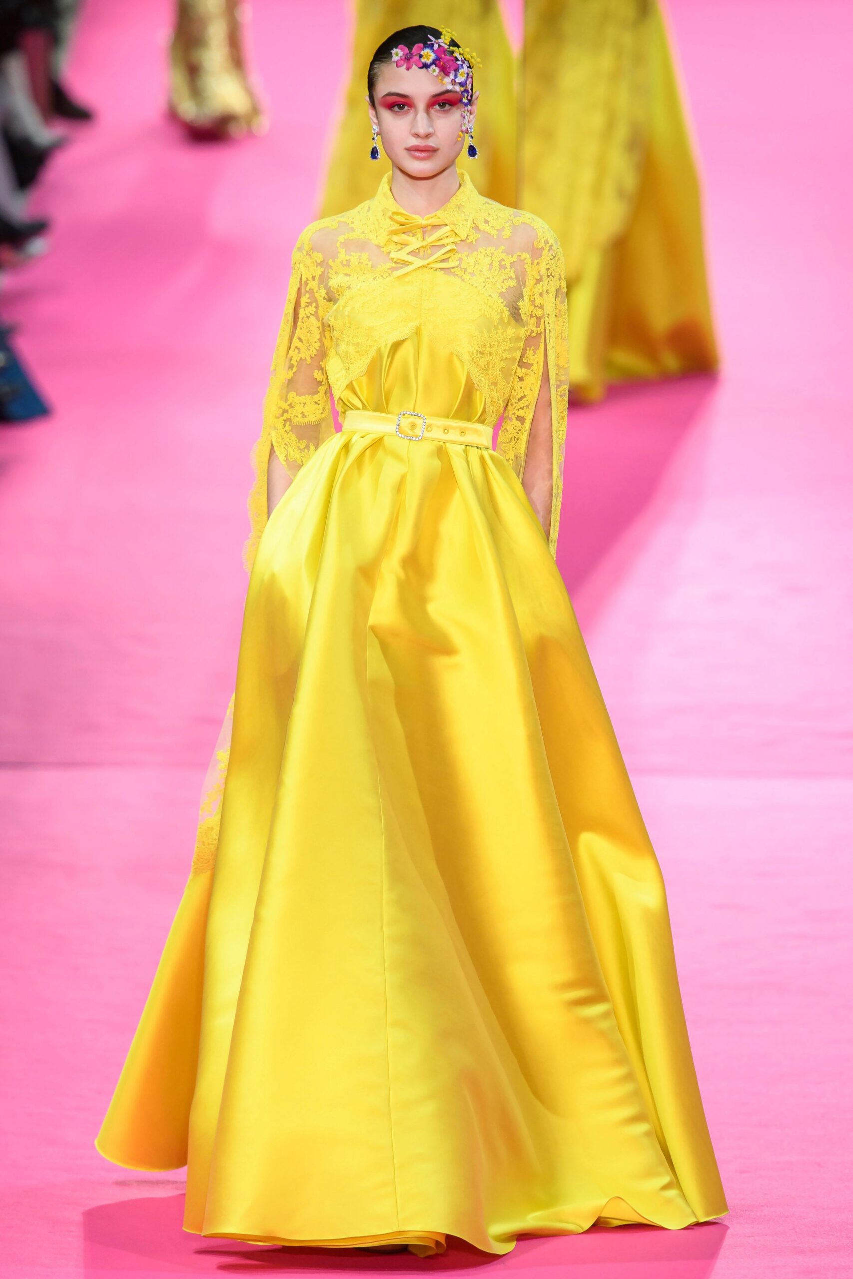 yellow silk gown with lace cape