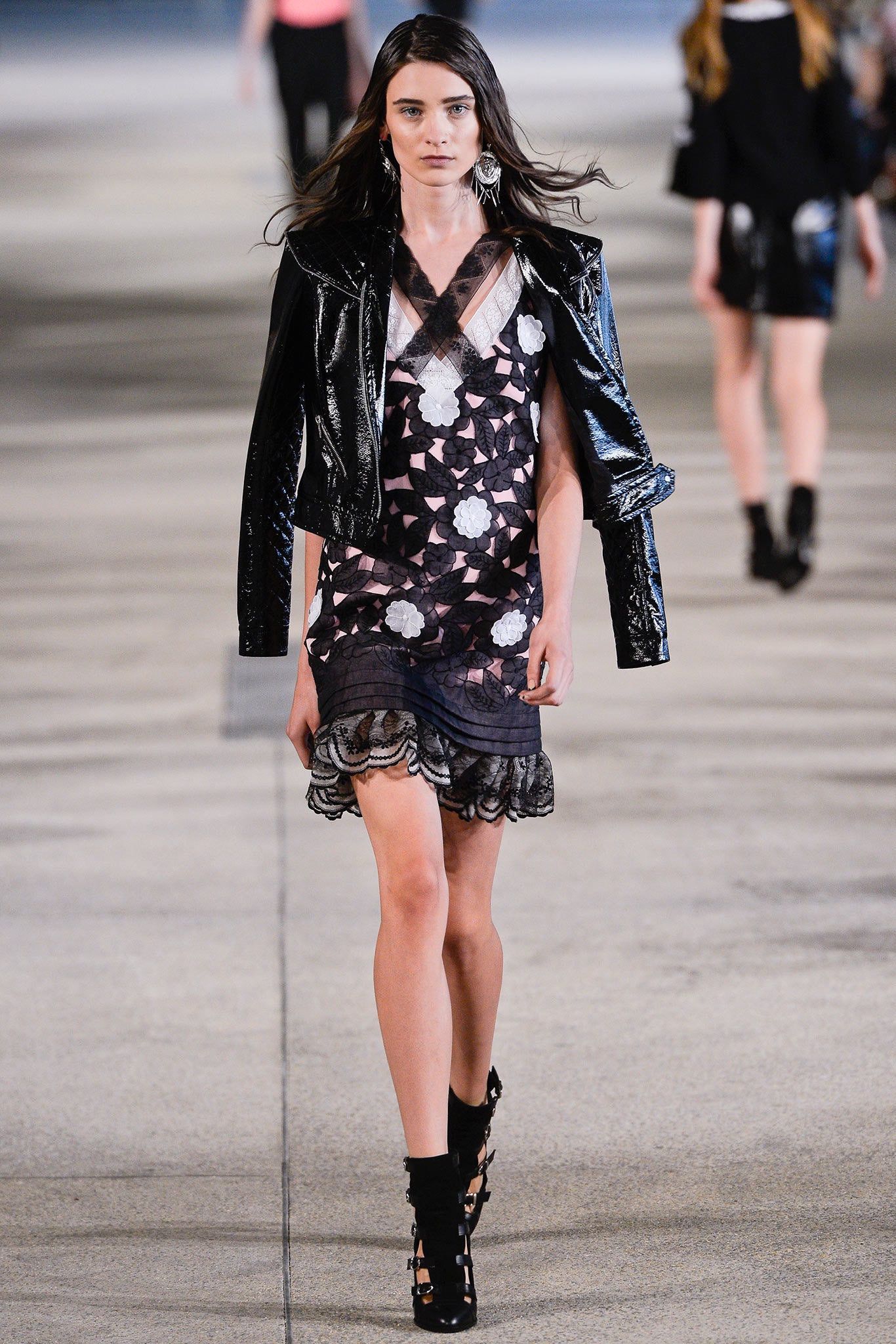 black mini dress with vinyl jacket