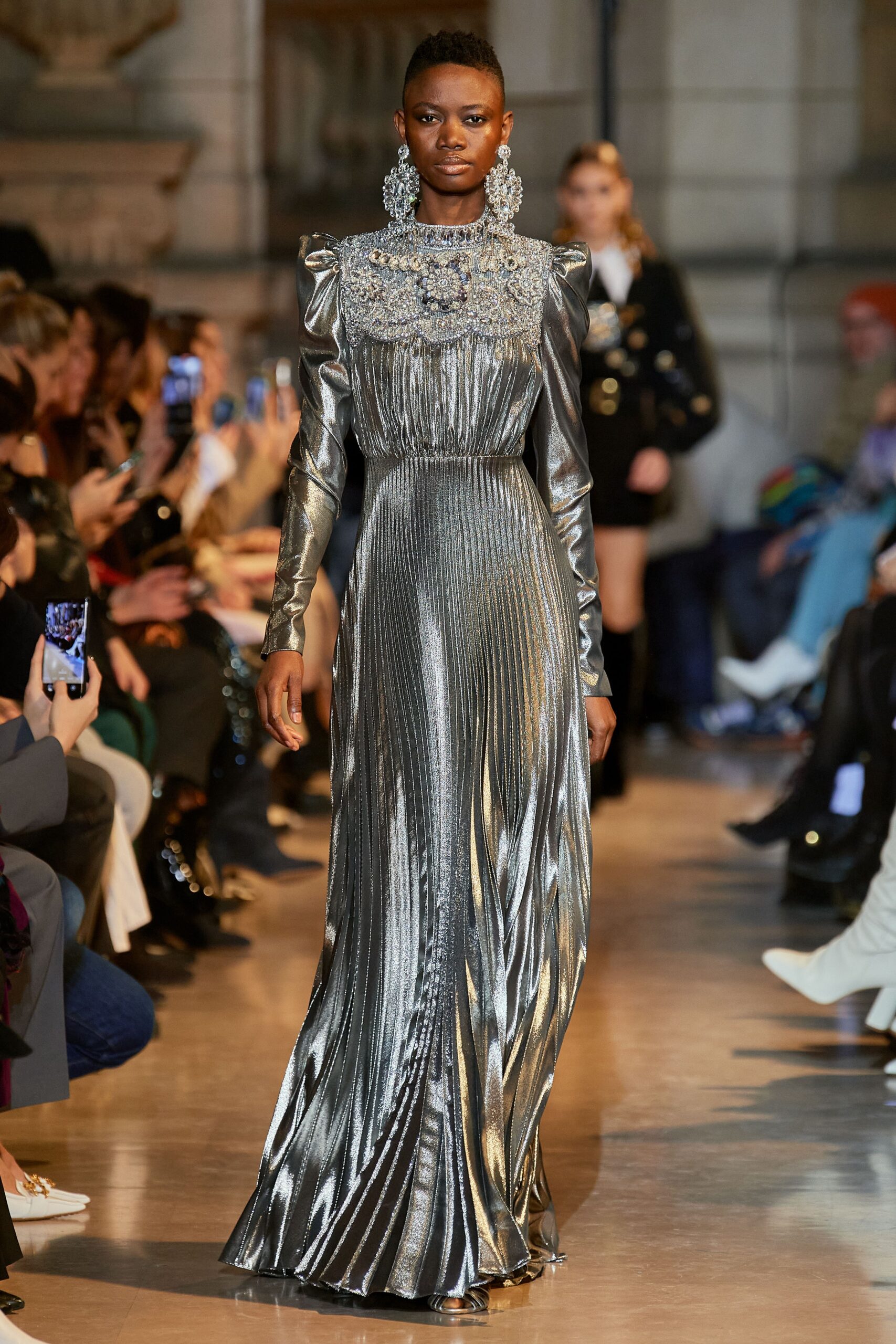 silver pleated long-sleeve gown