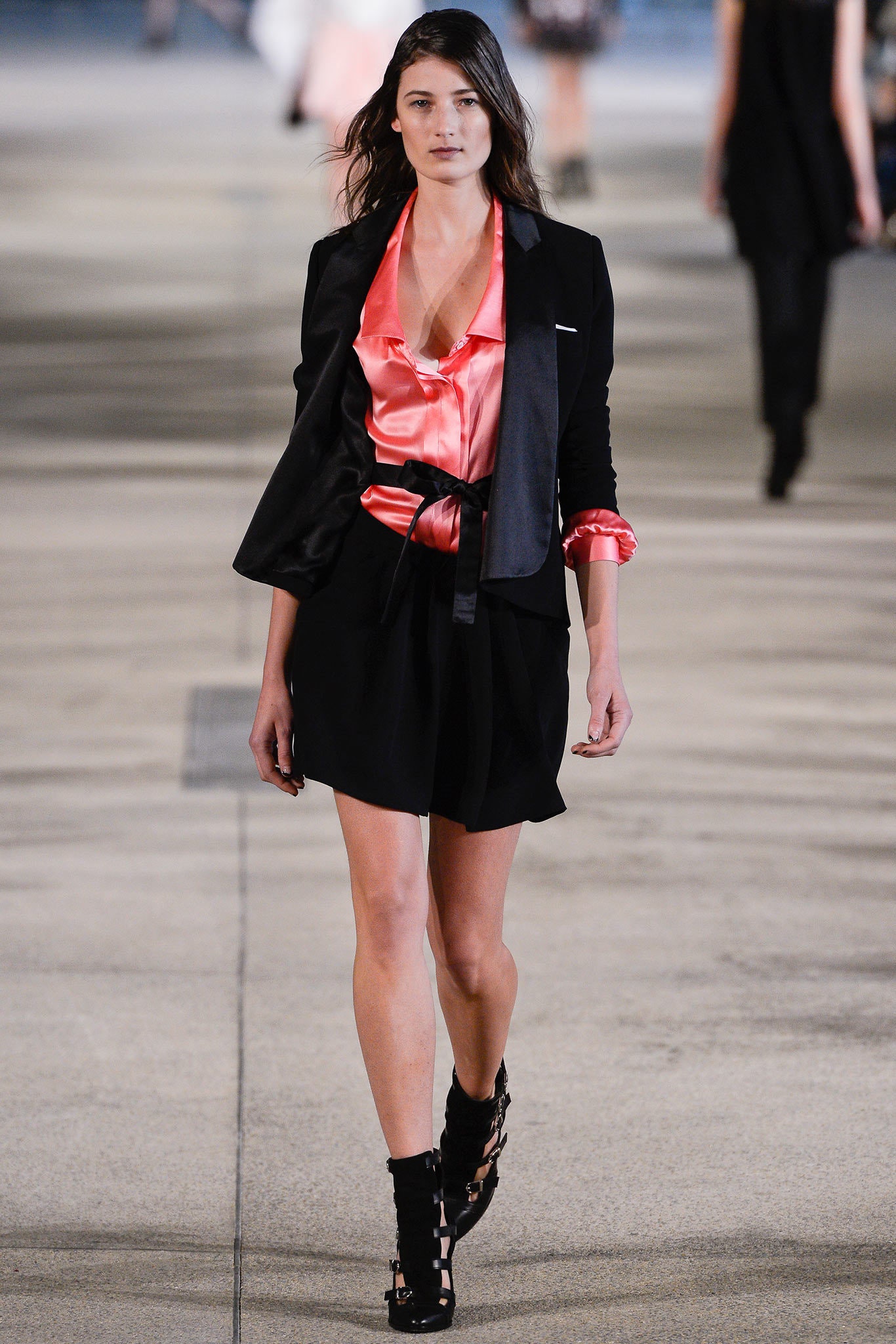 black blazer pink top pleated skirt