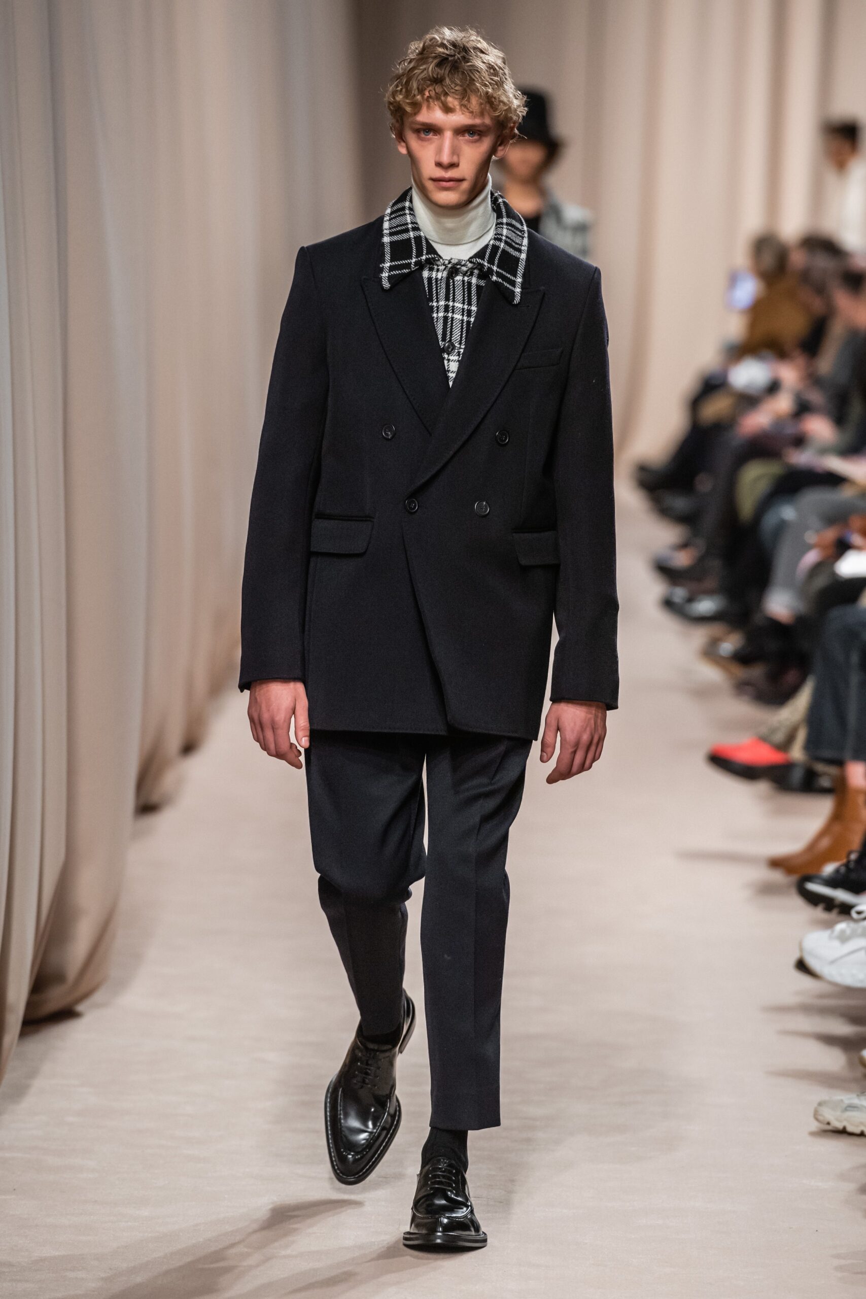 black tailored blazer with checked shirt