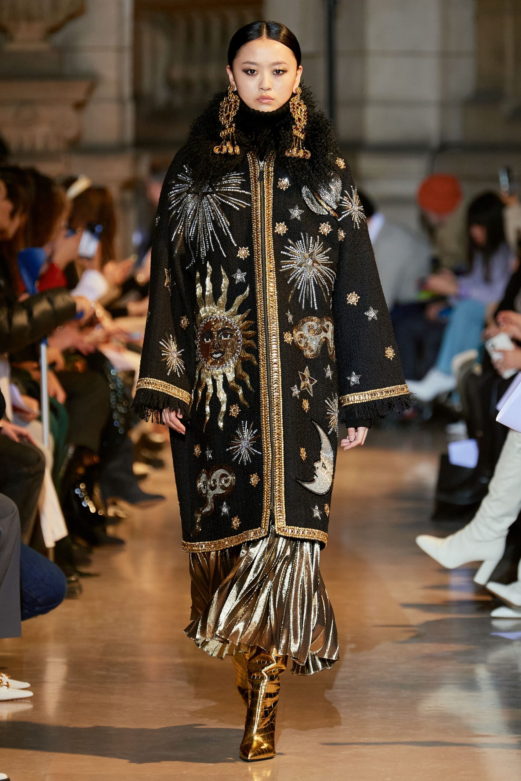 black embroidered coat with gold skirt