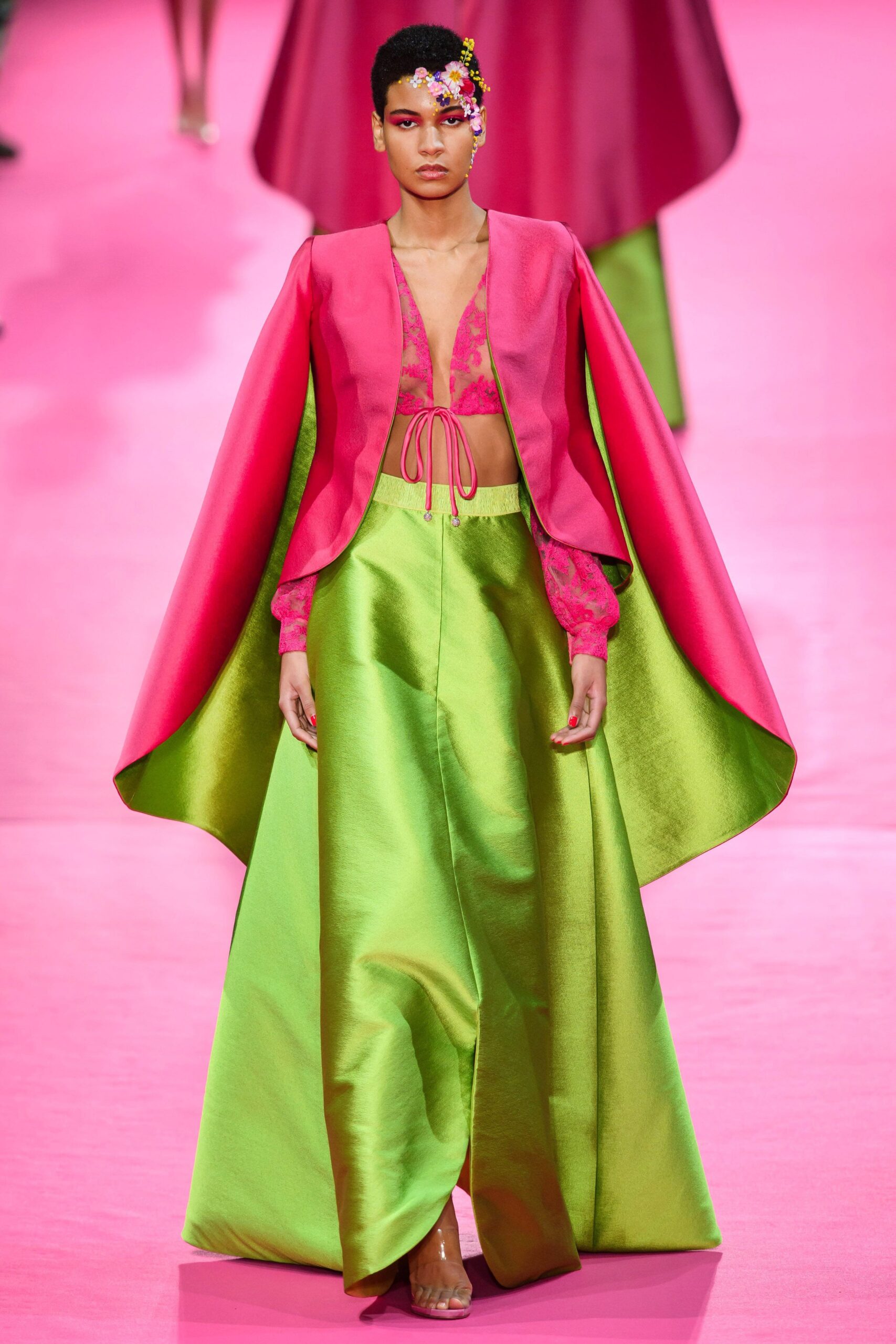 pink silk cape with red lace top and green flared skirt