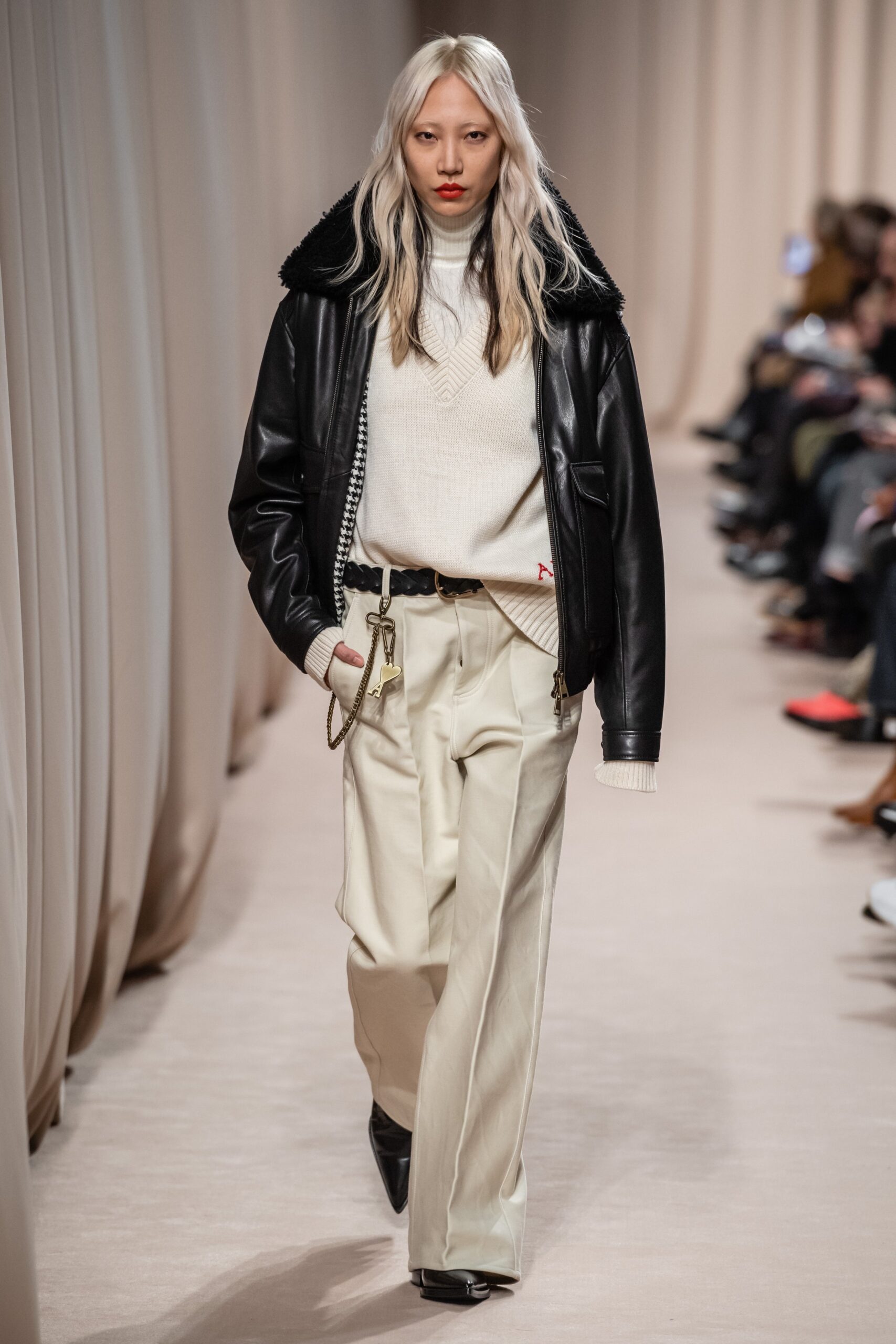 black leather jacket with white sweater