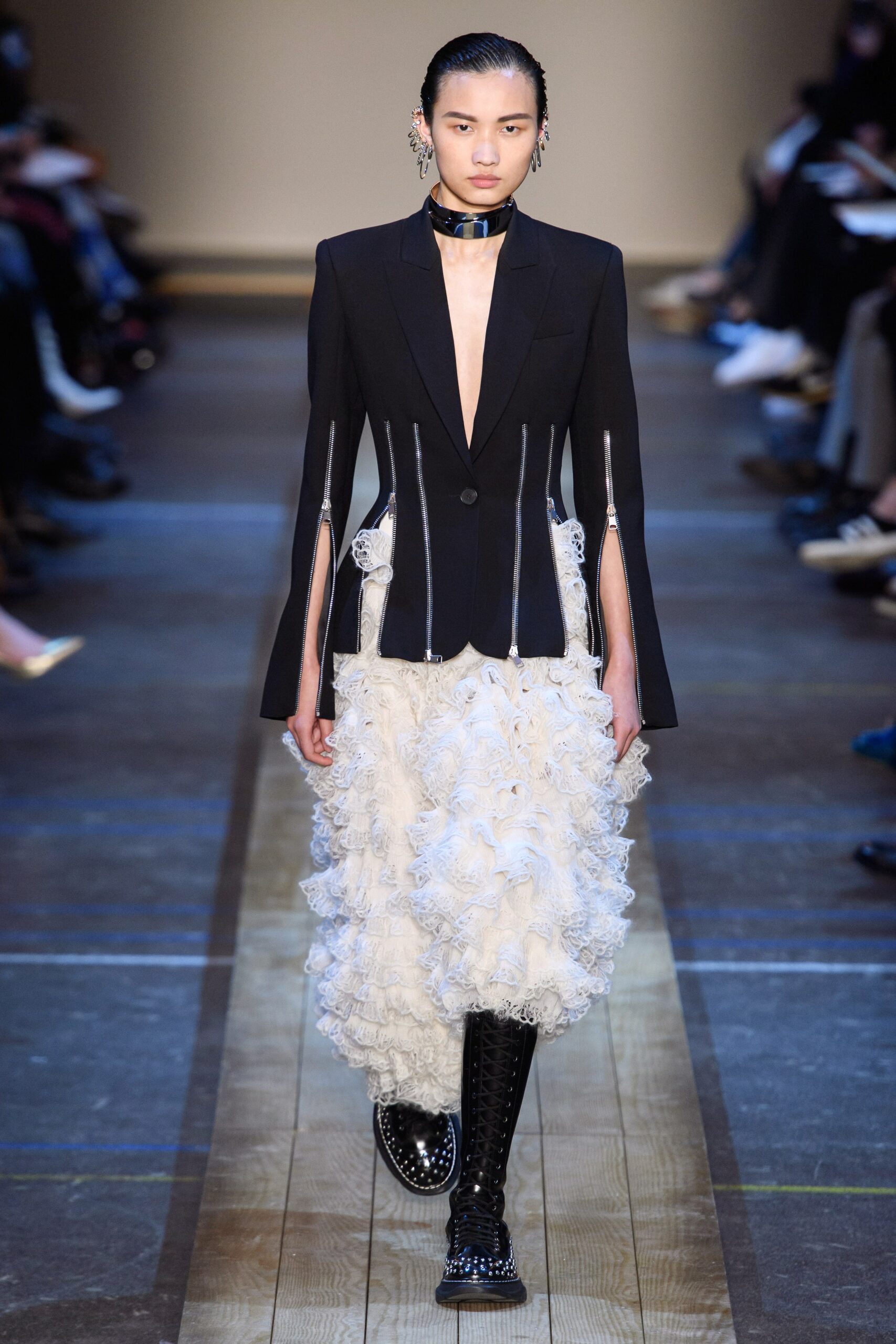 black fitted blazer white ruffled skirt