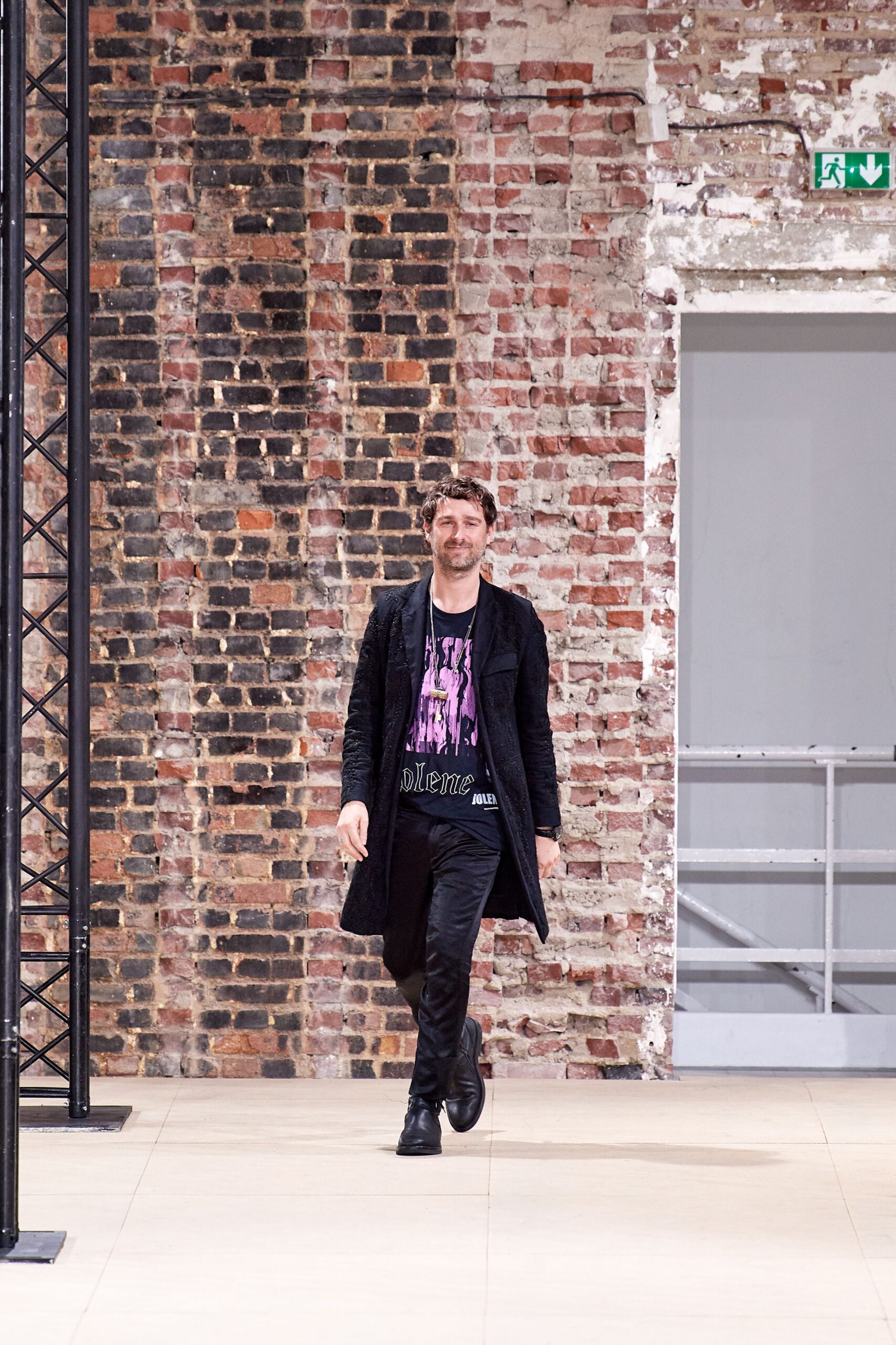 black coat and t-shirt outfit