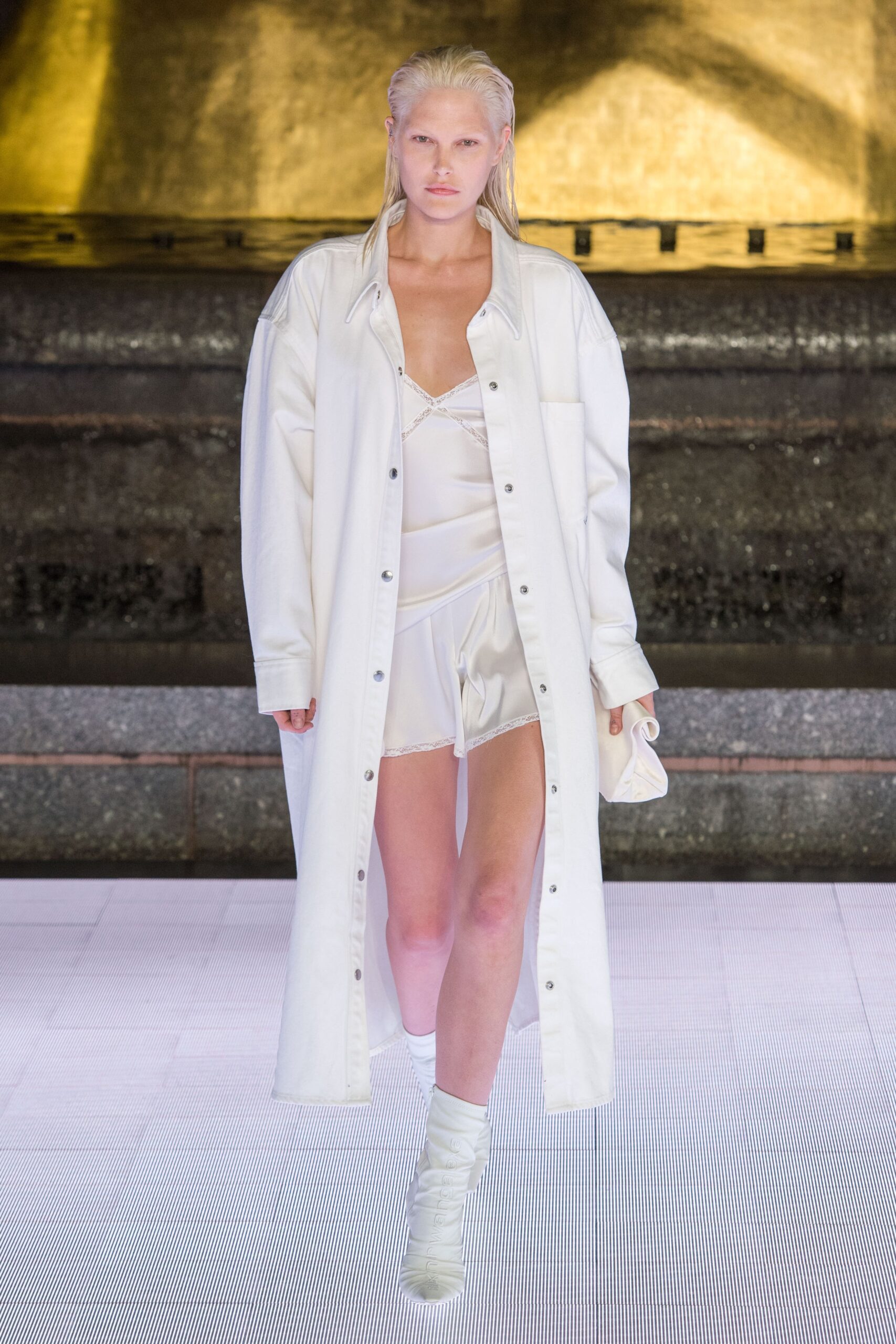 white cotton long-sleeve collared oversized buttoned coat