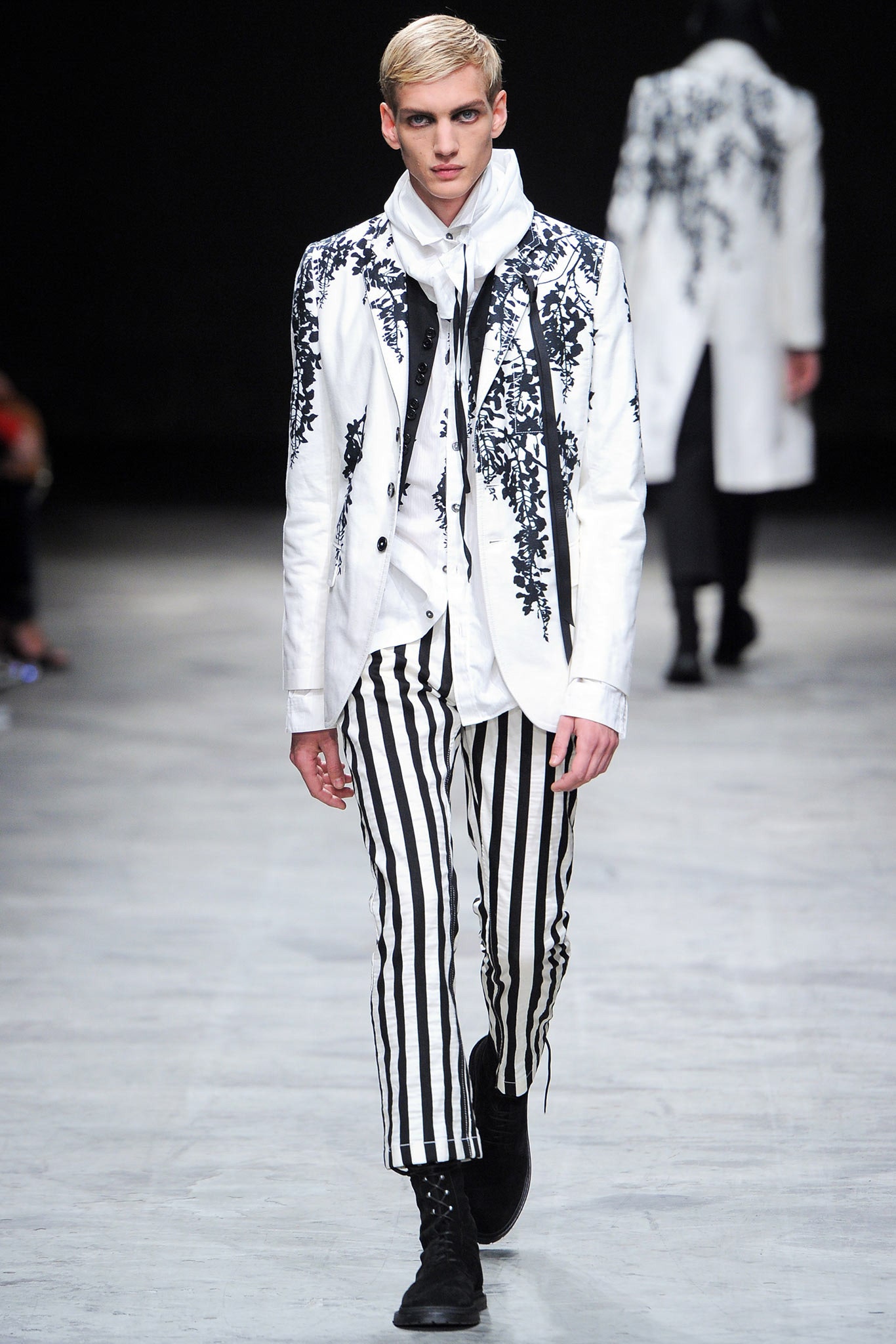 tailored white blazer with striped pants