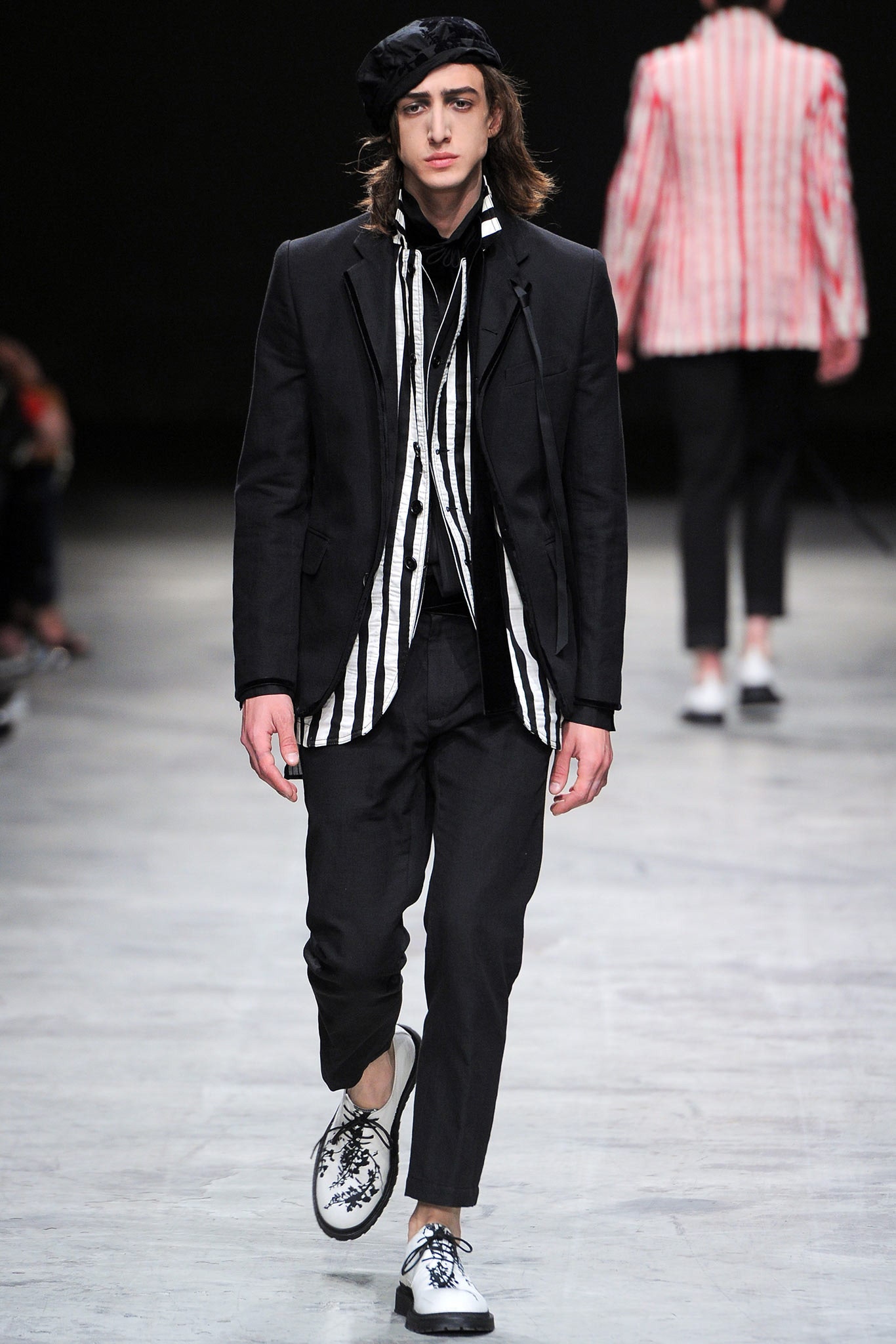 black tailored suit with striped shirt