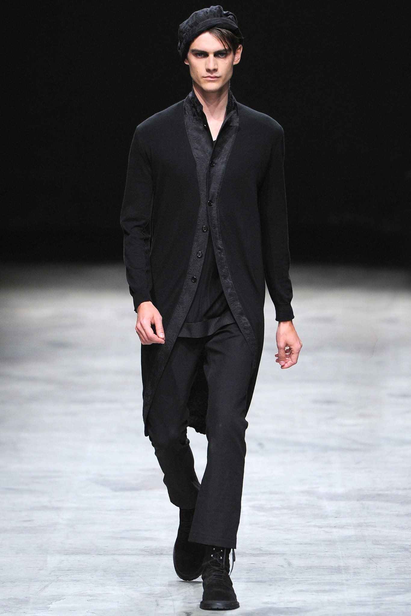 black relaxed coat and slim pants
