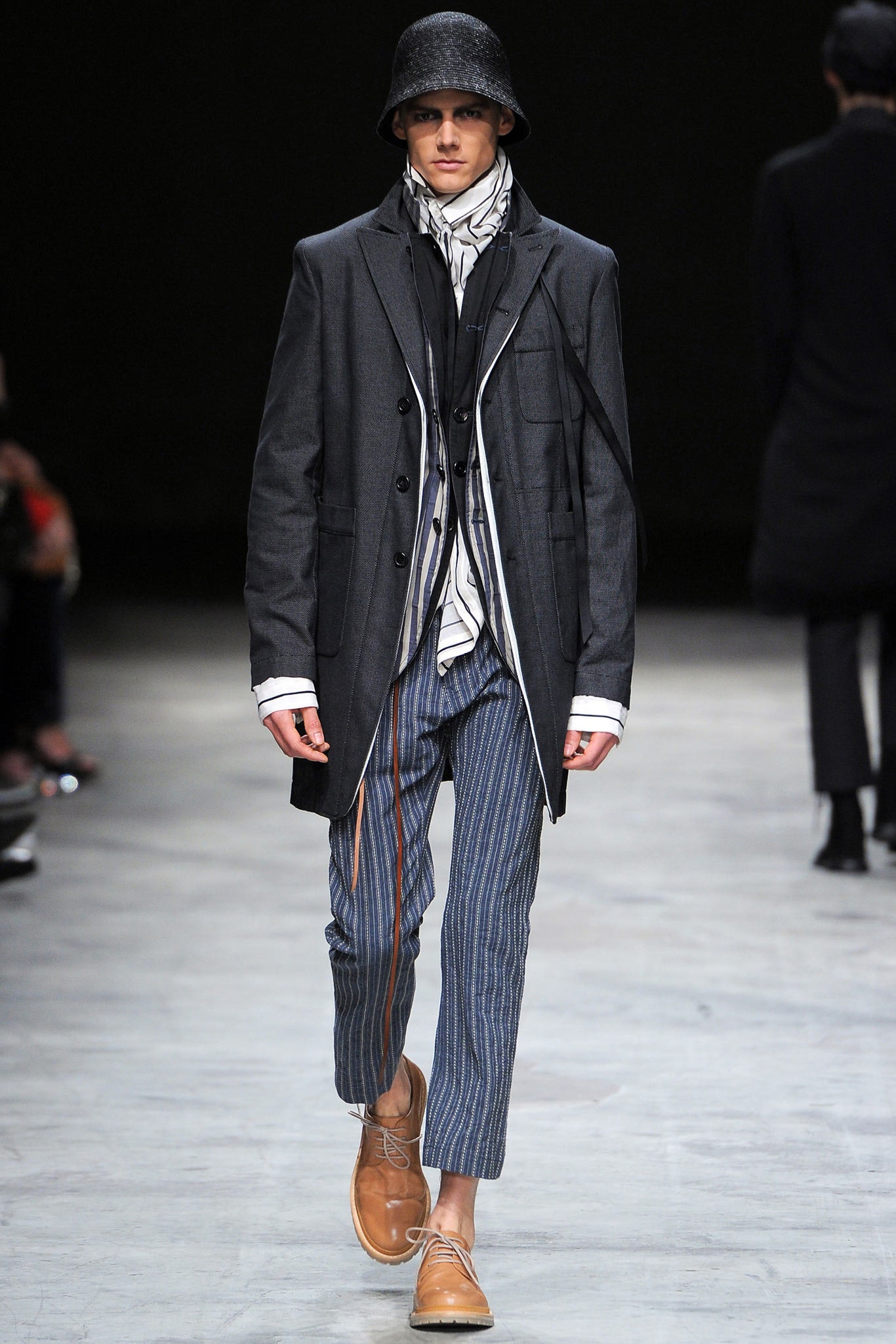 black wool coat with striped pants