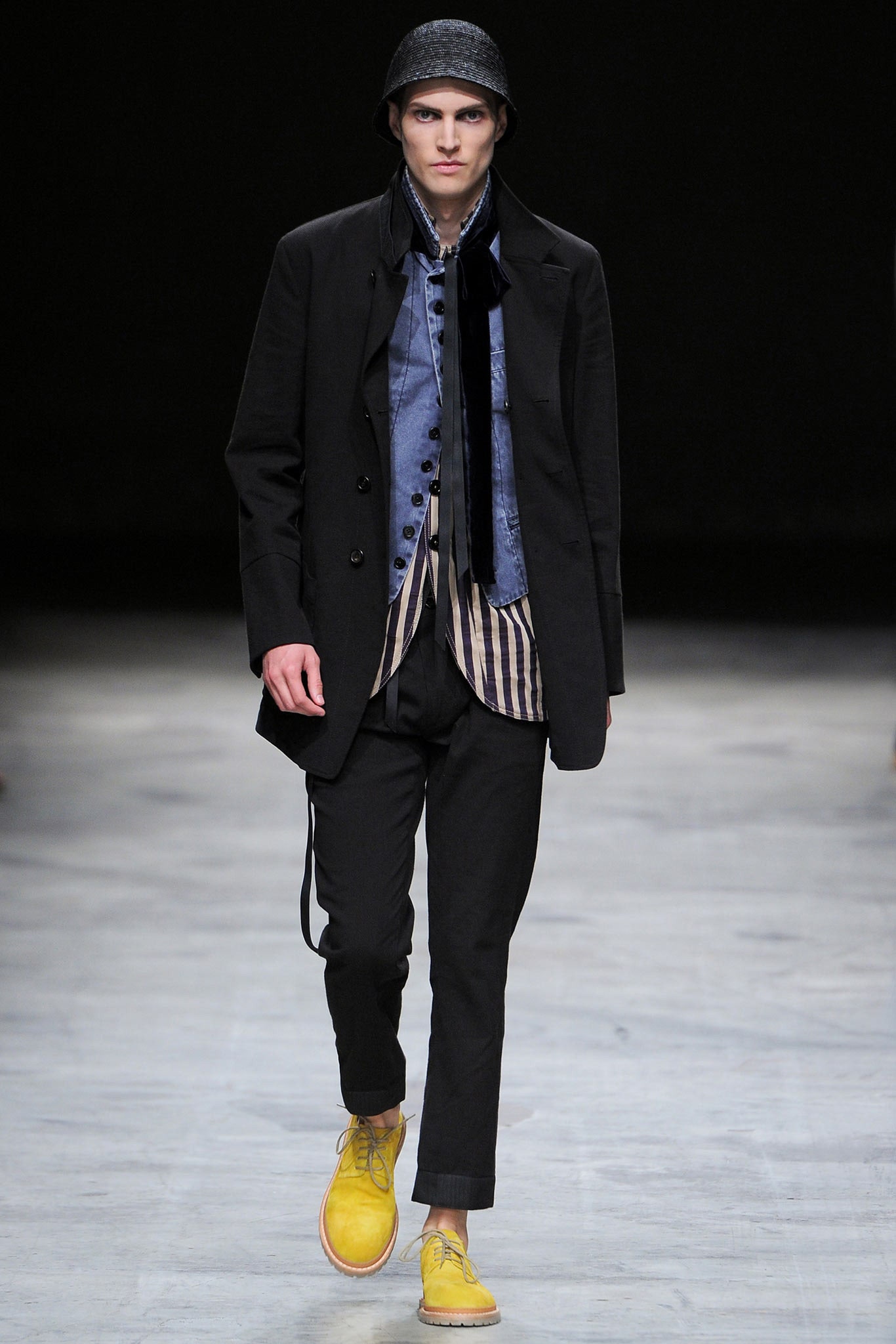 black coat with blue striped shirt