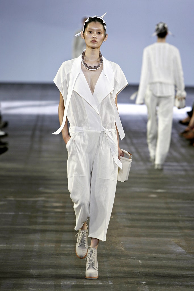 white relaxed jumpsuit with shoes