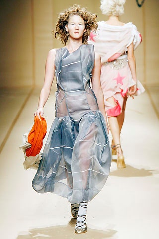 blue sheer midi dress with orange bag