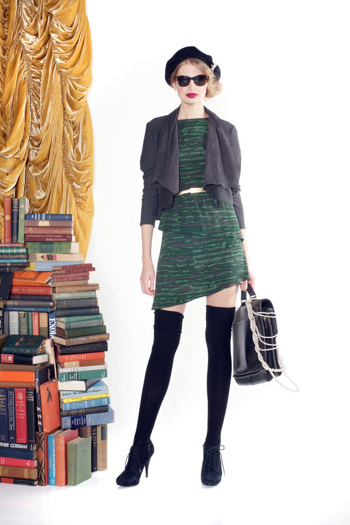 fitted green mini dress with gray jacket