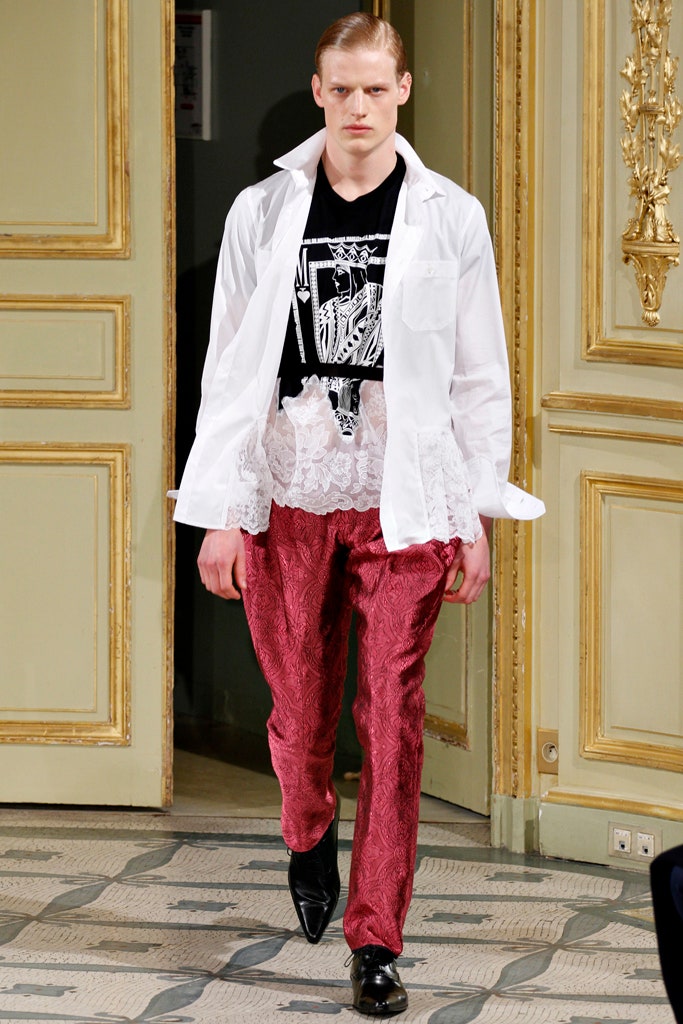 white shirt black t-shirt red pants