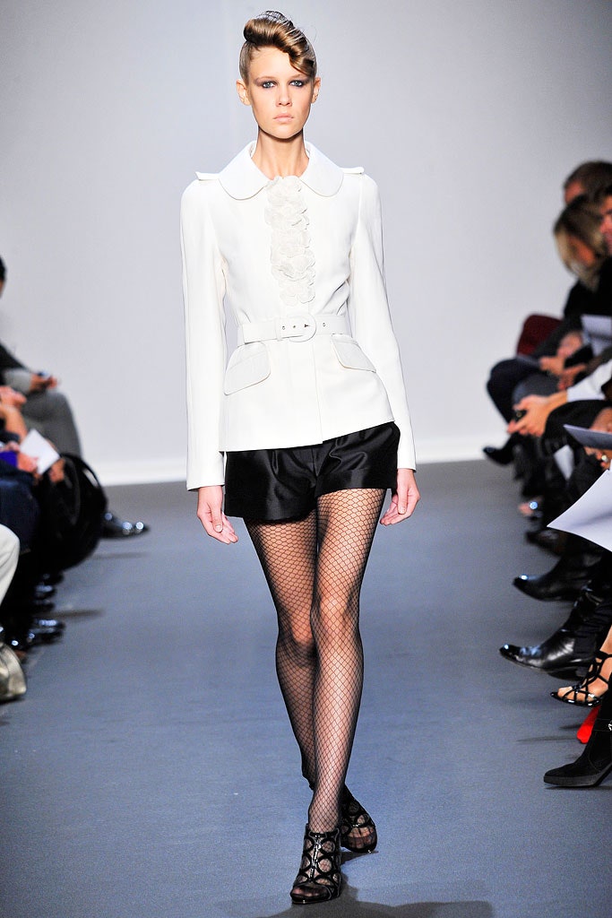 white cotton long-sleeve collared fitted buttoned belted blazer