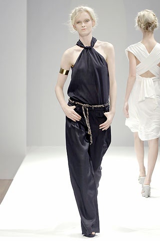 black silk relaxed jumpsuit and white asymmetric dress