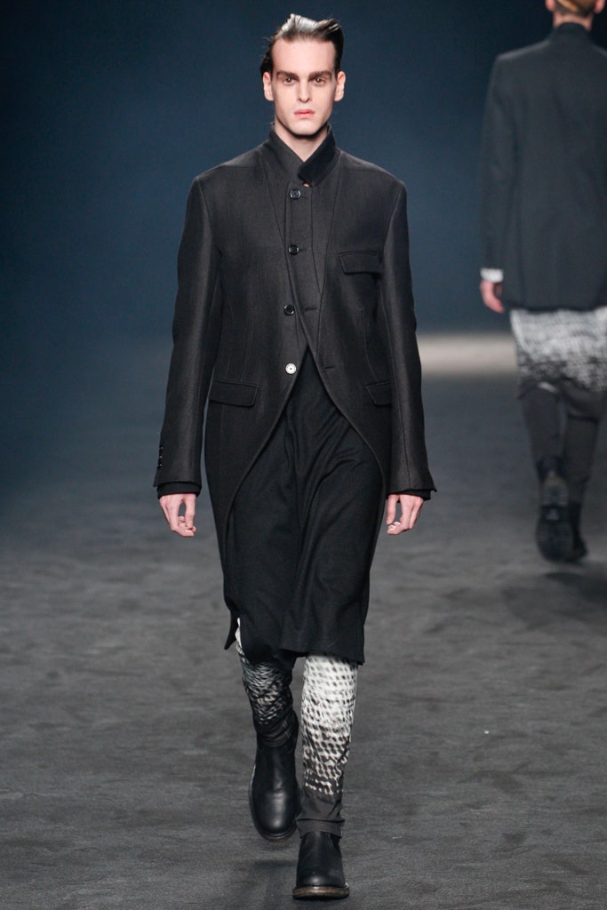 black wool coat with relaxed pants