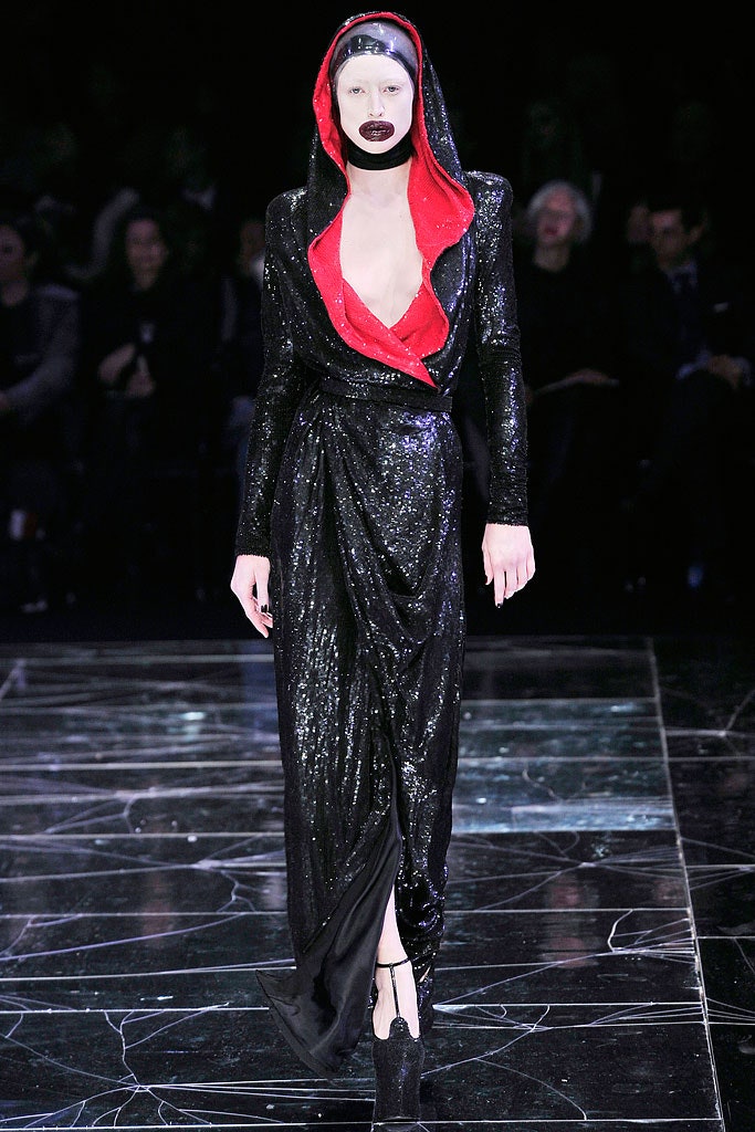 black and red sequined hooded gown