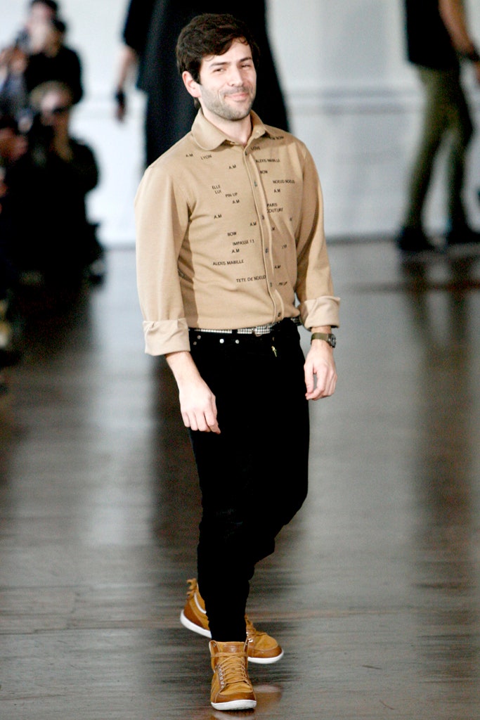 beige fitted shirt with black pants
