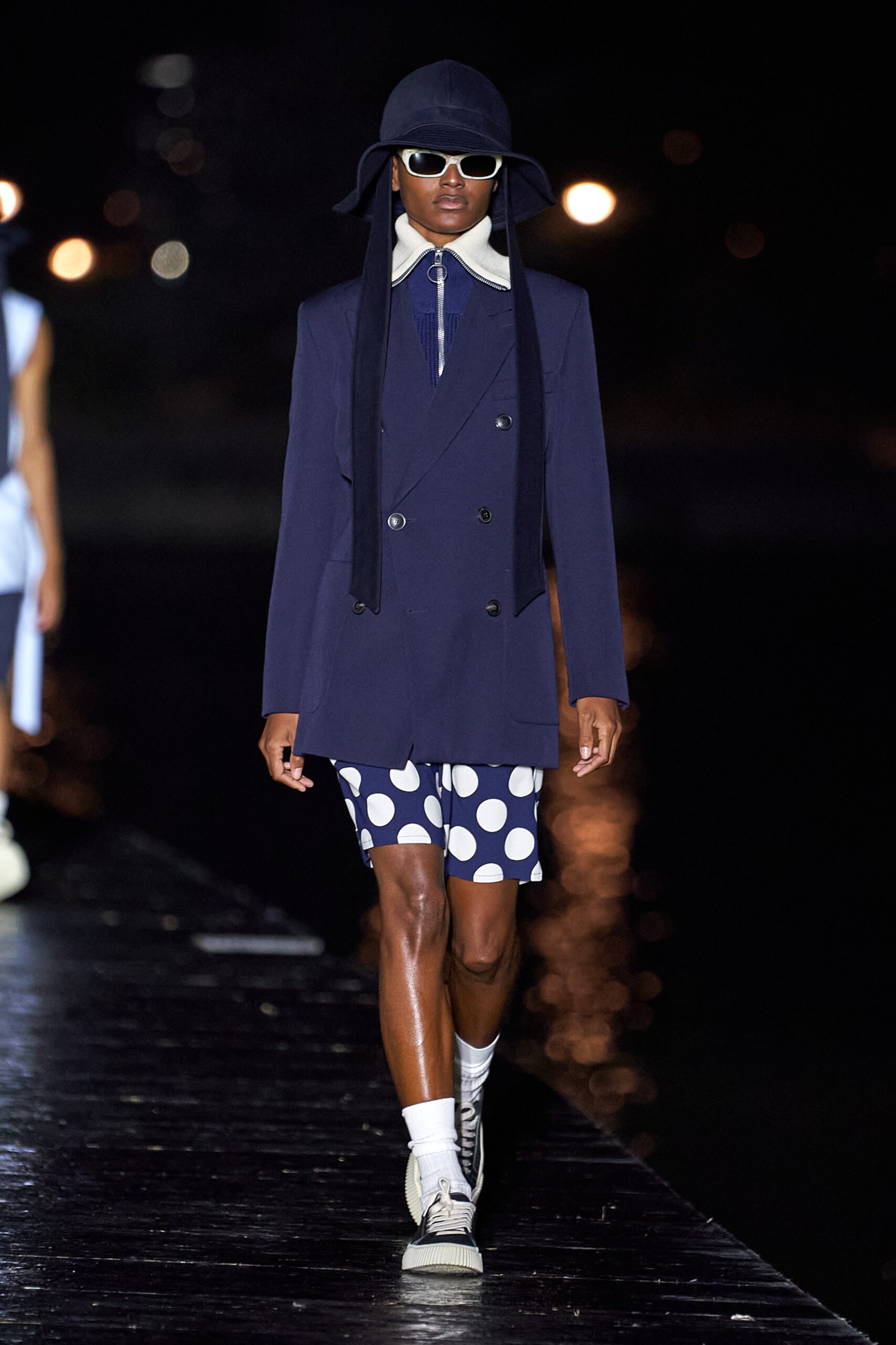 blue tailored jacket with polka-dot shorts