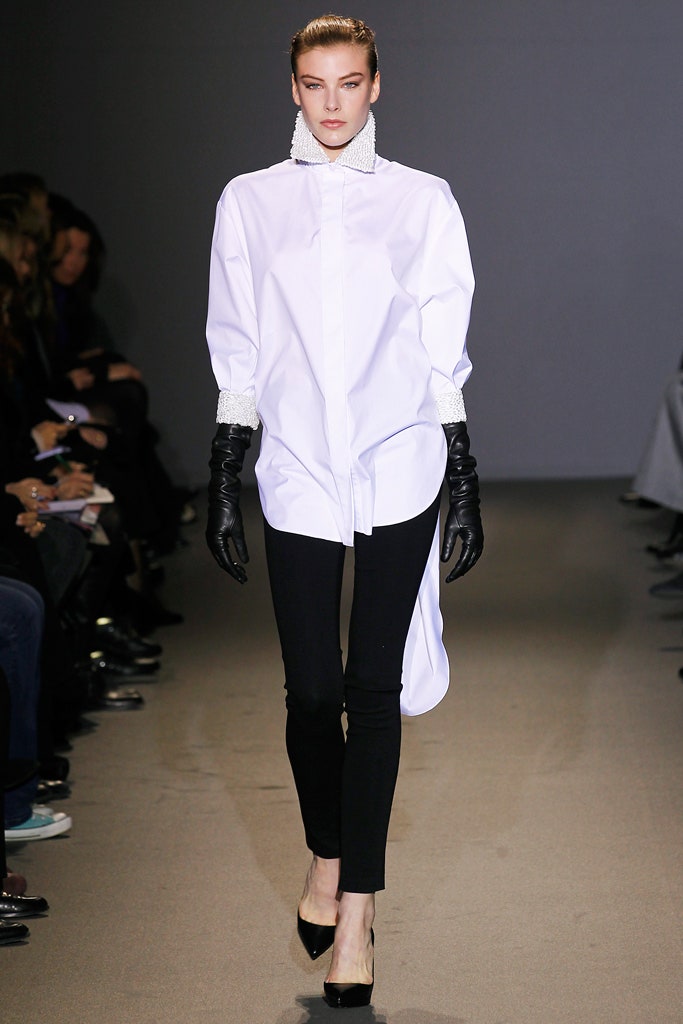 white relaxed shirt with black pants