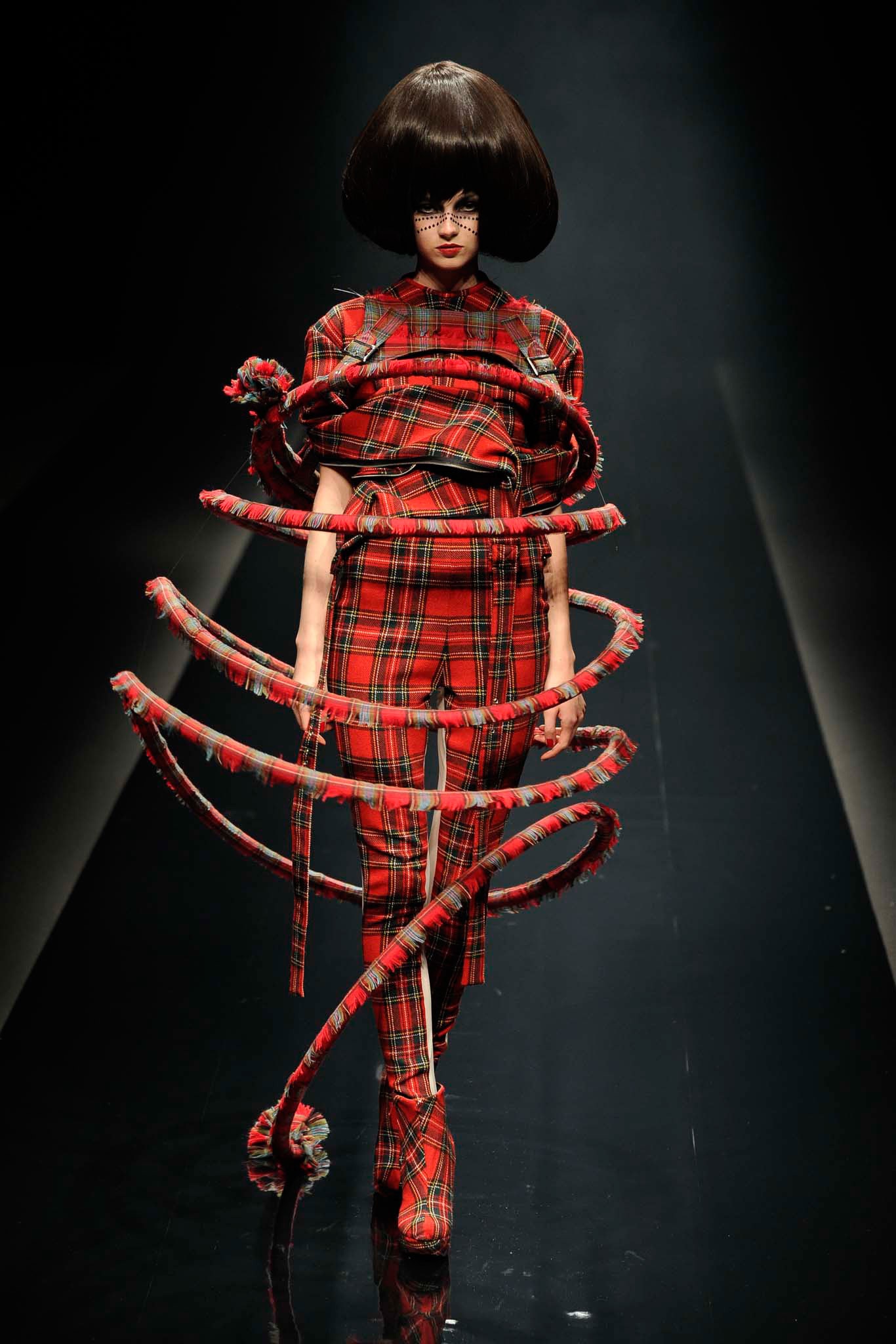 red and black checked outfit
