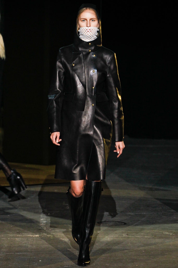 black leather fitted coat and boots